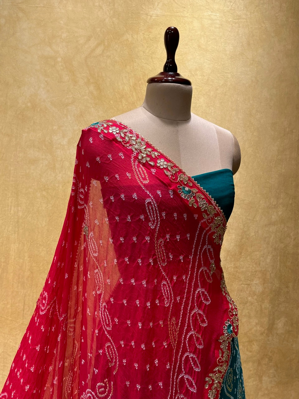 RAMA GREEN COLOUR PURE GEORGETTE OJARIYA BANDHEJ LEHENGA EMBELLISHED WITH GOTA PATTI & CUTDANA WORK