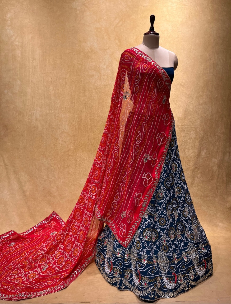 (DELIVERY IN 25 DAYS) BLUE COLOUR GEORGETTE BANDHEJ LEHENGA EMBELLISHED WITH GOTA PATTI & CUTDANA WORK