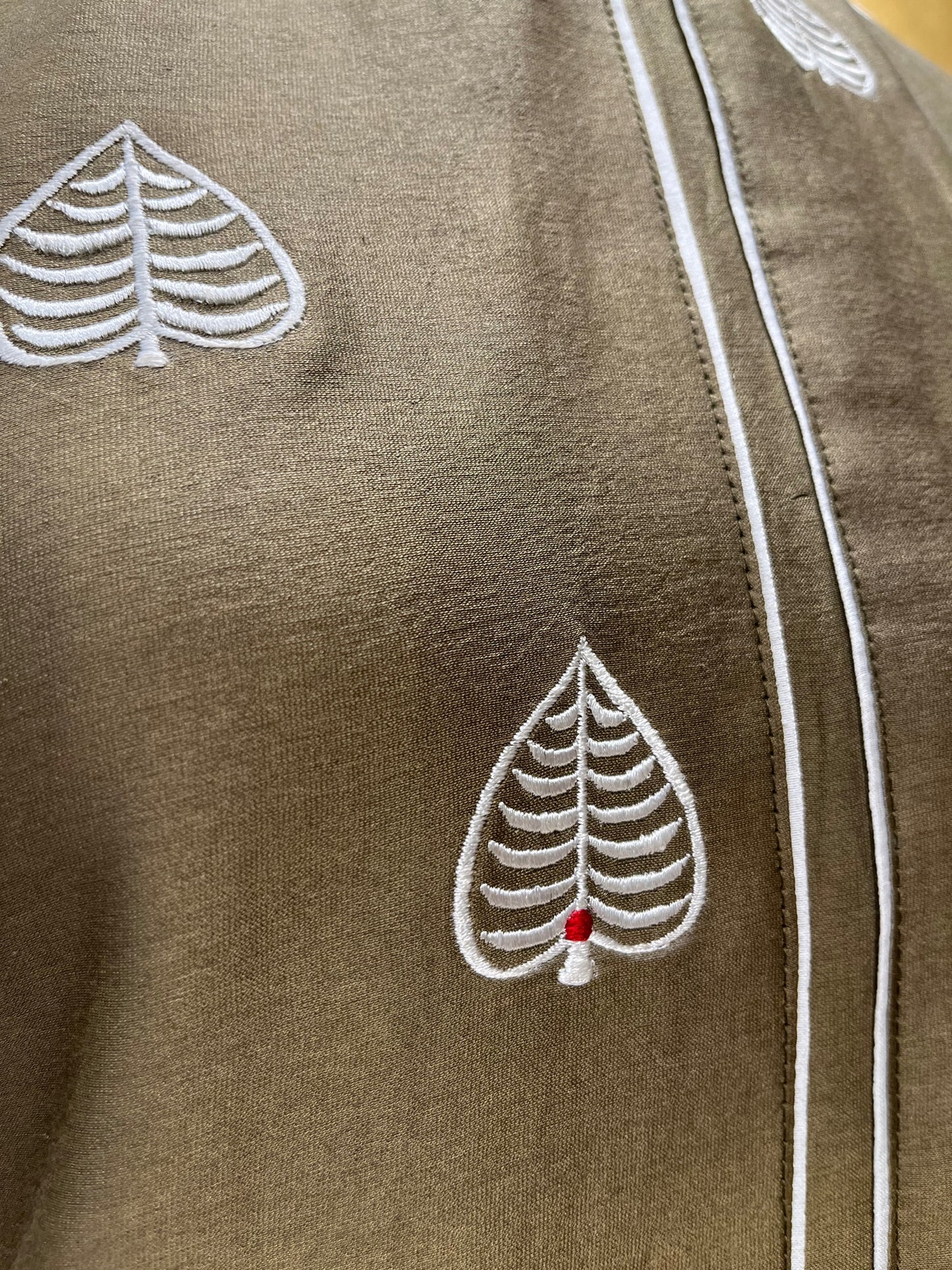 OLIVE GREEN PARTY WEAR COLOUR CHANDERI SILK KURTI EMBELLISHED WITH RESHAM WORK BY SIDDHAIKA