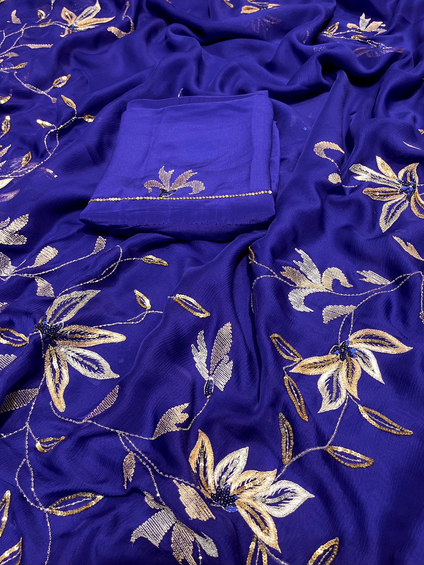 ( DELIVERY IN 20-25 DAYS ) BLUE COLOUR PURE CHIFFON HAND EMBROIDERED SAREE EMBELLISHED WITH AARI, SEQUINS & CUTDANA WORK