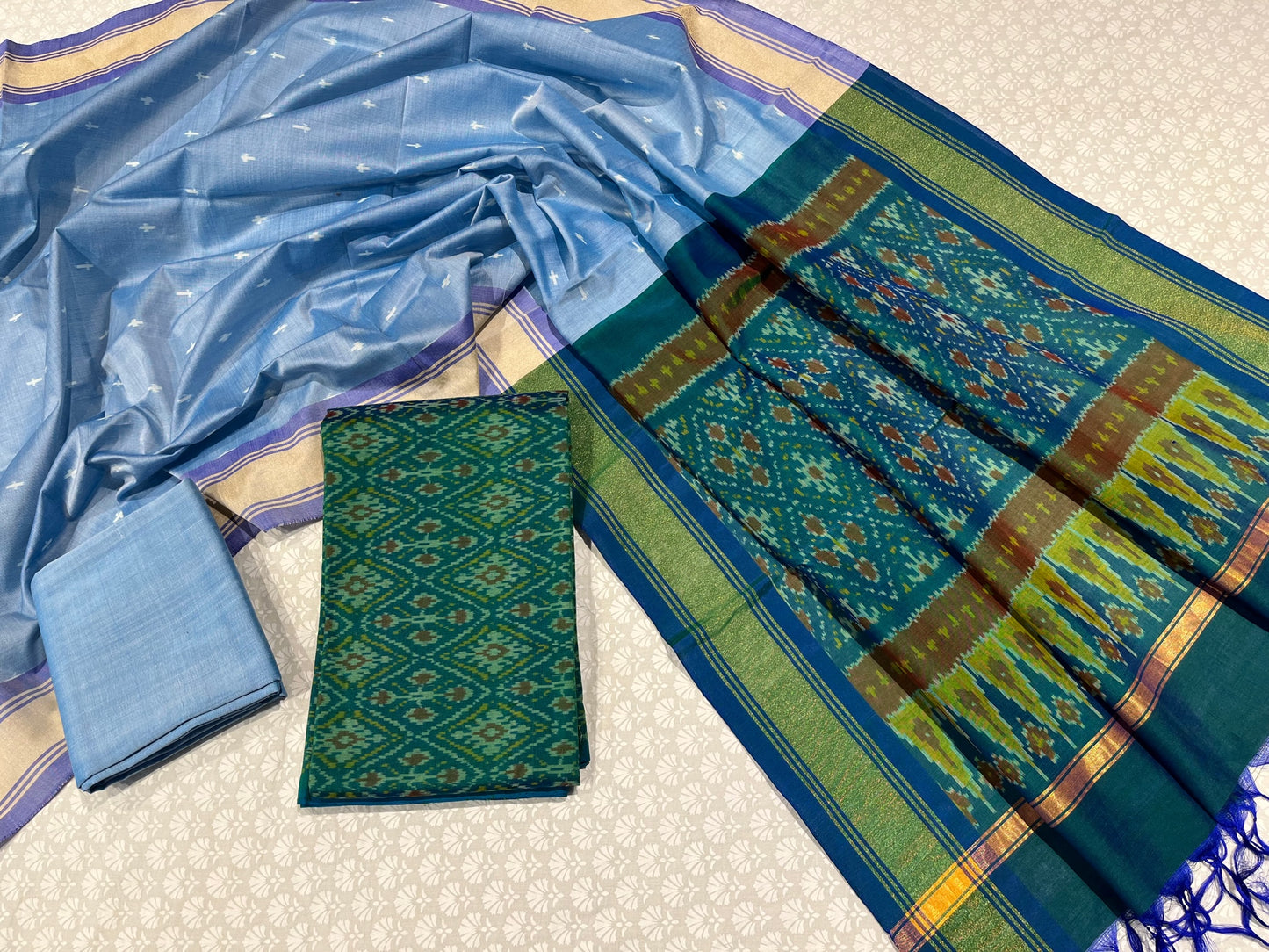 GREEN COLOUR IKAT SILK UNSTITCHED SUIT WITH CONTRAST DUPATTA