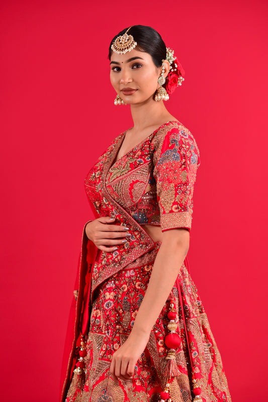 ( DELIVERY IN 25 DAYS ) RED COLOUR SILK WEDDING HAND EMBROIDERED LEHENGA WITH READYMADE BLOUSE & NET DUPATTA EMBELLISHED WITH RESHAM, CUTDANA & SEQUINS WORK