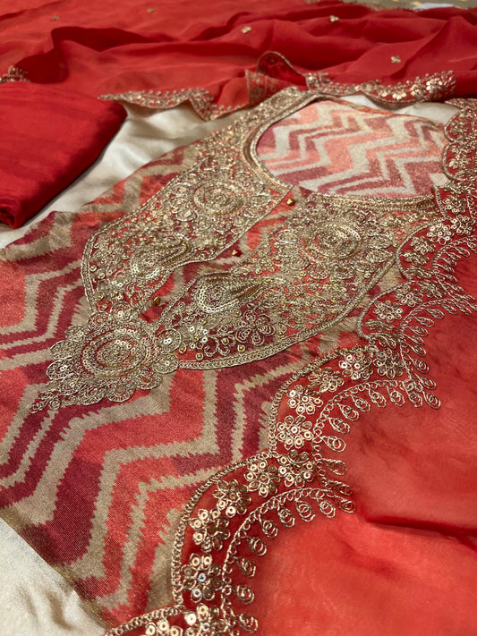 RUST ORANGE COLOUR LAMIA TISSUE UNSTITCHED SUIT WITH ORGANZA DUPATTA EMBELLISHED WITH KASAB & SEQUINS WORK