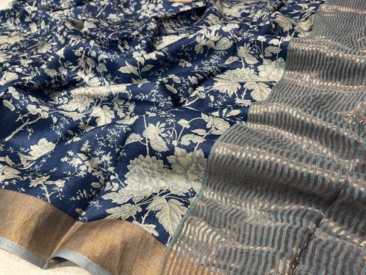 (DELIVERY IN 25 DAYS) BLUE COLOUR TUSSAR SILK PRINTED SAREE WITH ZARI BORDER