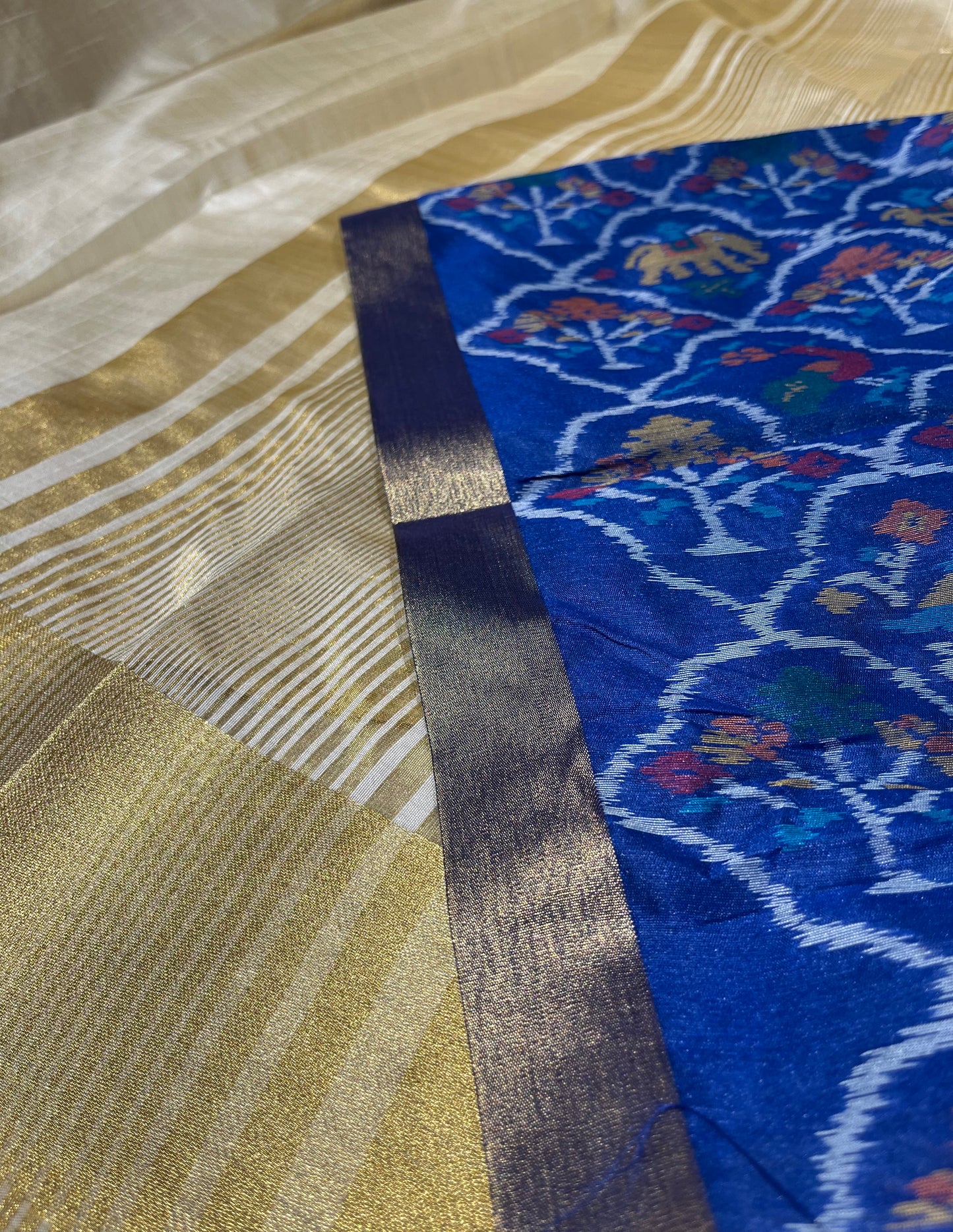 IVORY COLOUR ART TUSSAR SILK SAREE WITH CONTRAST PATOLA UNSTITCHED BLOUSE - Kothari Sons
