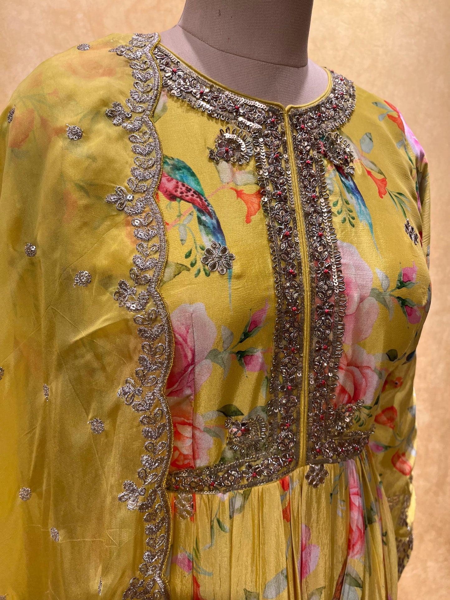 YELLOW COLOUR PRINTED CHINON FLOOR LENGTH SUIT WITH ORGANZA DUPATTA EMBELLISHED WITH ZARI EMBROIDERY