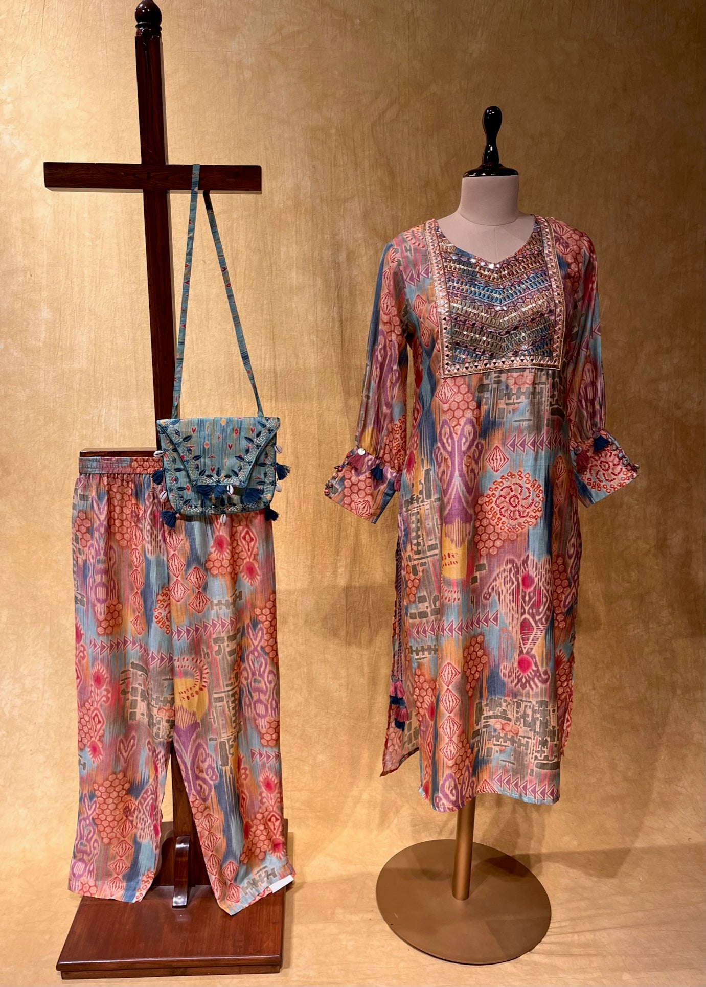 MULTI COLOUR MUSLIN SILK EMBROIDERED KURTA SETS WITH SLING BAG EMBELLISHED WITH MIRROR WORK