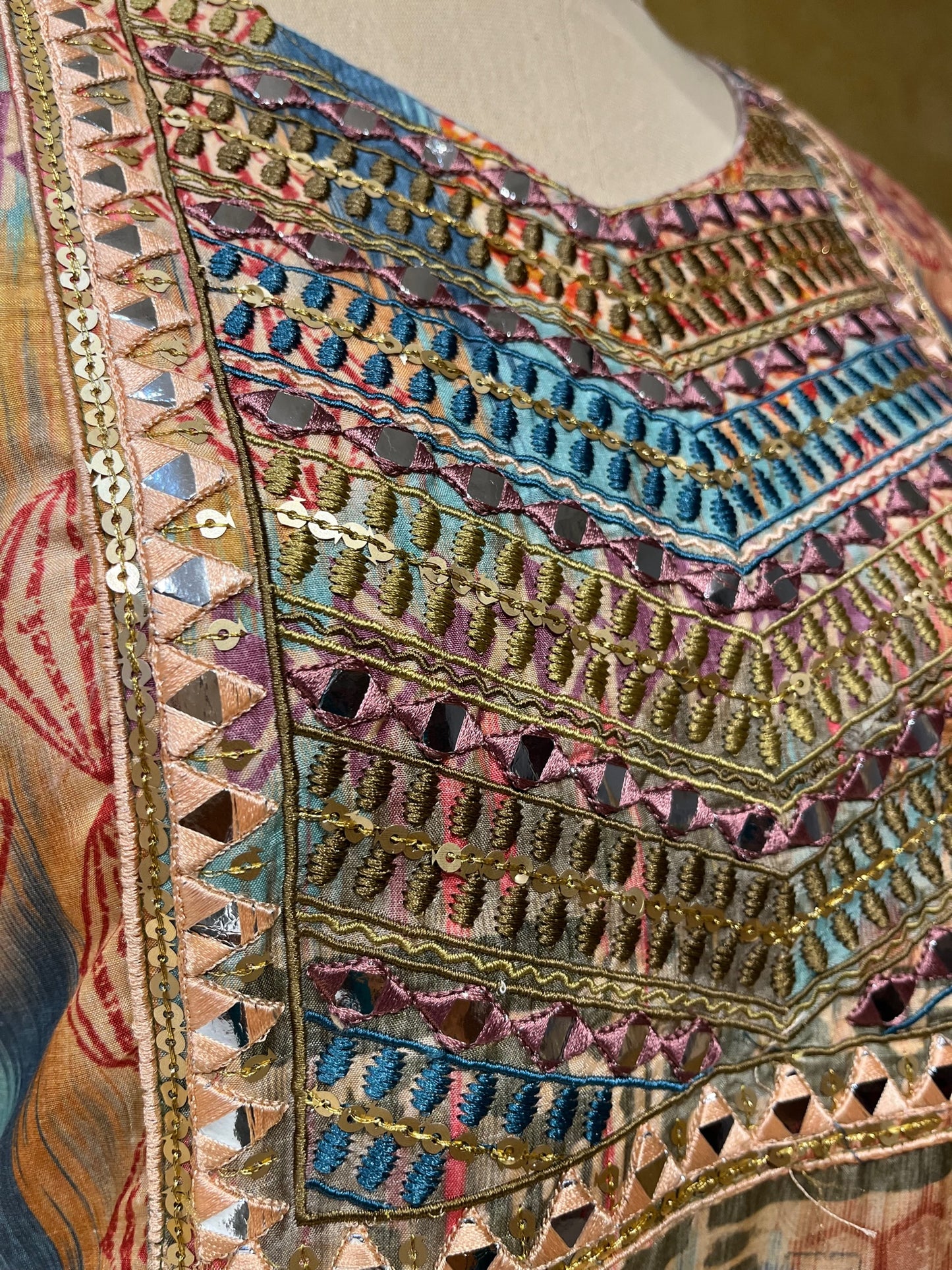MULTI COLOUR MUSLIN SILK EMBROIDERED KURTA SETS WITH SLING BAG EMBELLISHED WITH MIRROR WORK