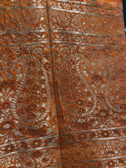 ( DELIVERY IN 25 DAYS ) ORANGE COLOUR BANARASI SILK LEHENGA EMBELLISHED WITH ZARI WEAVES