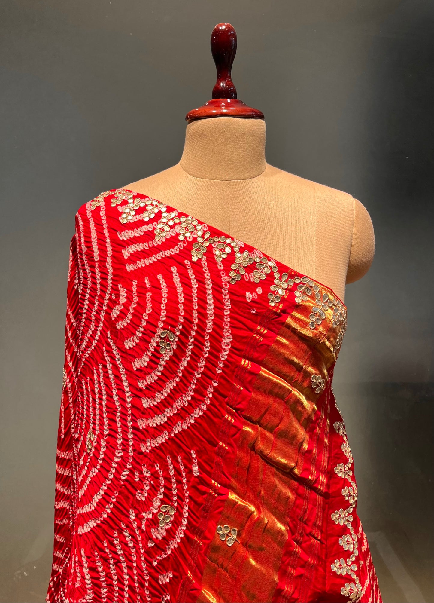 RED COLOUR PURE SATIN SILK BANDHEJ LEHENGA WITH UNSTITCHED BLOUSE EMBELLISHED WITH GOTA PATTI & ZARDOZI WORK