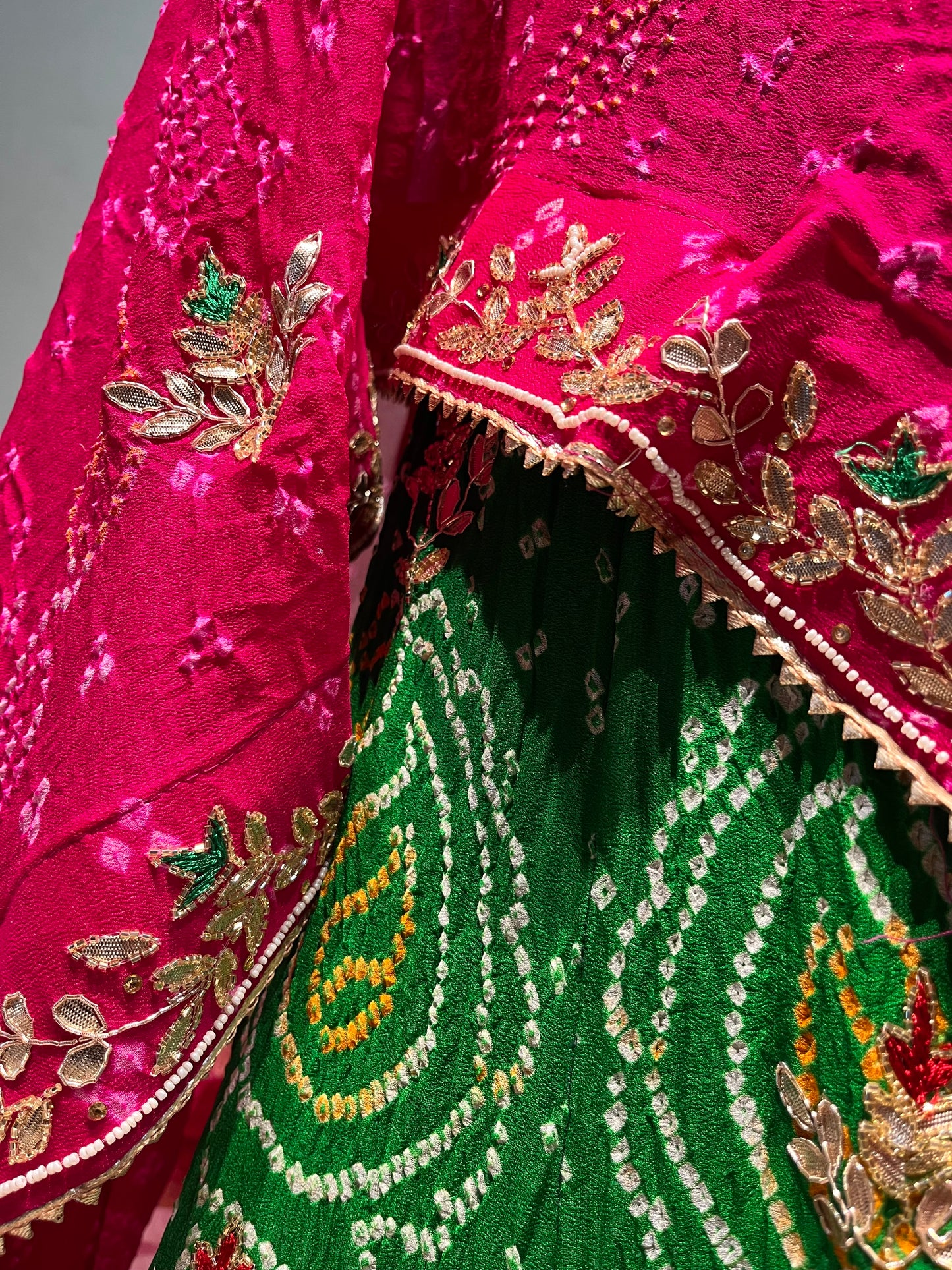 ( DELIVERY IN 20-25 DAYS ) GREEN COLOUR PURE OJARIYA BANDHEJ LEHENGA WITH UNSTITCHED BLOUSE EMBELLISHED WITH CUTDANA, GOTA PATTI & ZARDOZI WORK