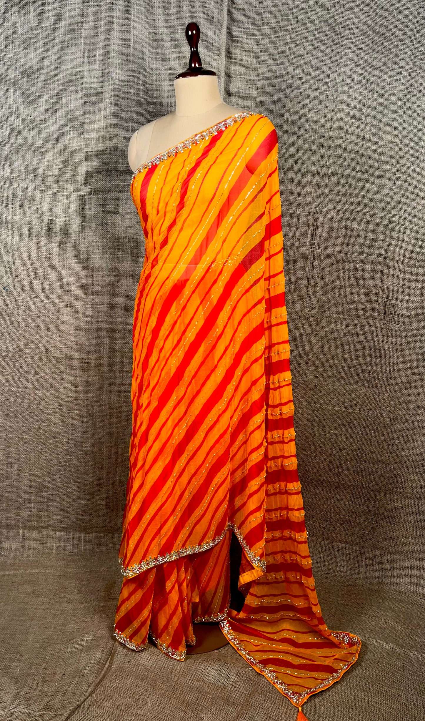 ( DELIVERY IN 30 DAYS ) MUSTARD COLOUR CHIFFON LEHARIYA SAREE EMBELLISHED WITH CUTDANA WORK