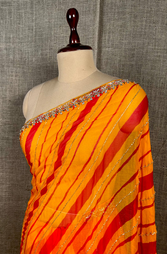 ( DELIVERY IN 30 DAYS ) MUSTARD COLOUR CHIFFON LEHARIYA SAREE EMBELLISHED WITH CUTDANA WORK