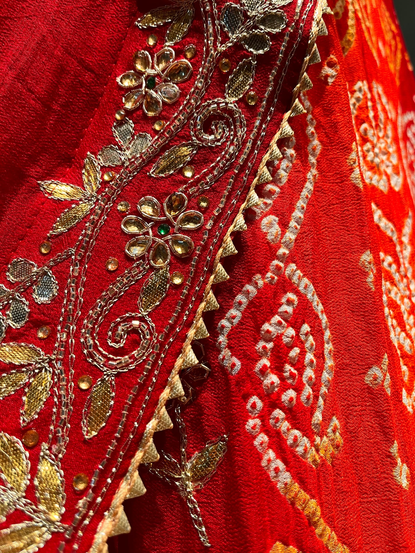 ORANGE & RED COLOUR PURE OJARIYA BANDHEJ LEHENGA WITH UNSTITCHED BLOUSE EMBELLISHED WITH GOTA PATTI, CUTDANA & ZARDOZI WORK