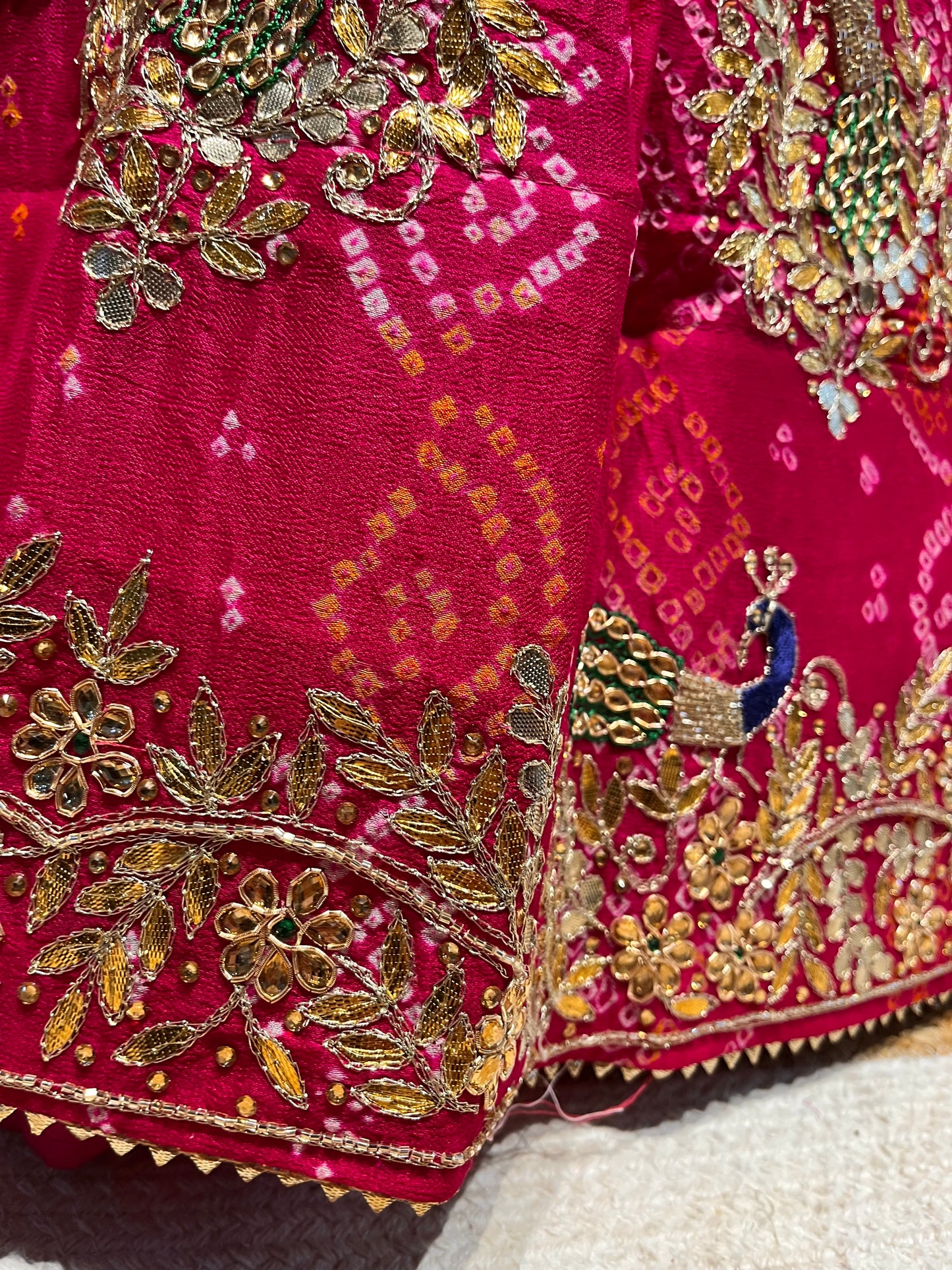 PINK COLOUR PURE OJARIYA BANDHEJ LEHENGA WITH UNSTITCHED BLOUSE EMBELLISHED WITH CUTDANA, GOTA PATTI & ZARDOZI WORK