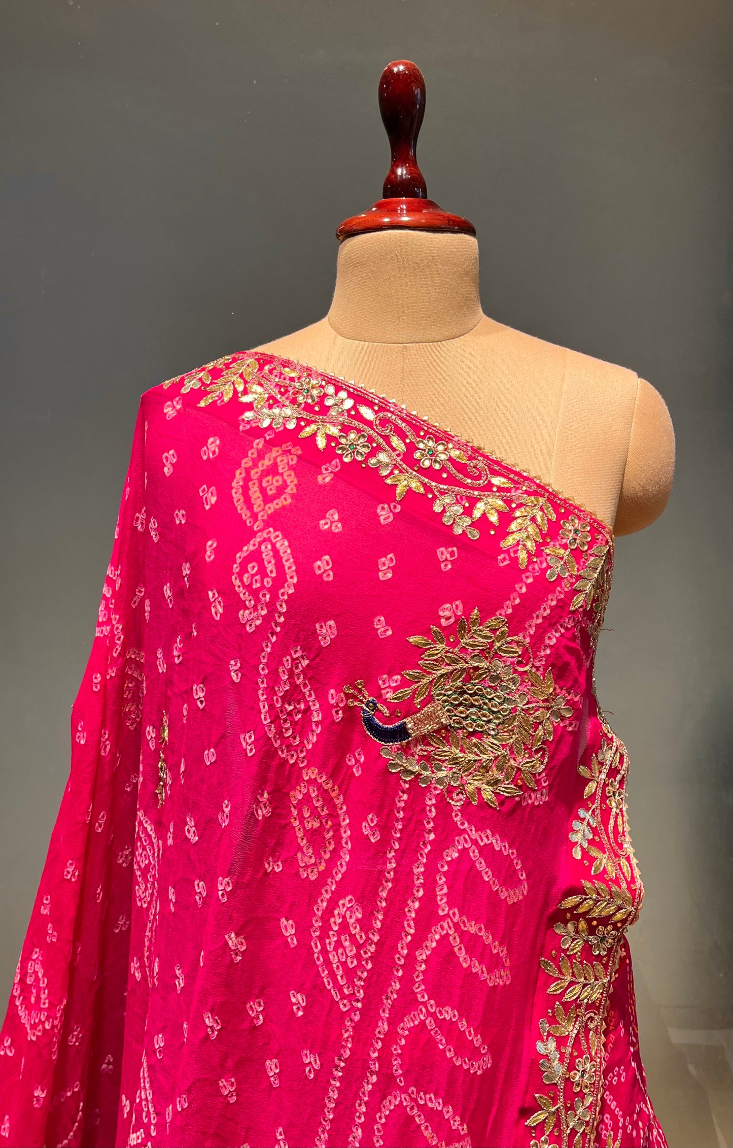 PINK COLOUR PURE OJARIYA BANDHEJ LEHENGA WITH UNSTITCHED BLOUSE EMBELLISHED WITH CUTDANA, GOTA PATTI & ZARDOZI WORK