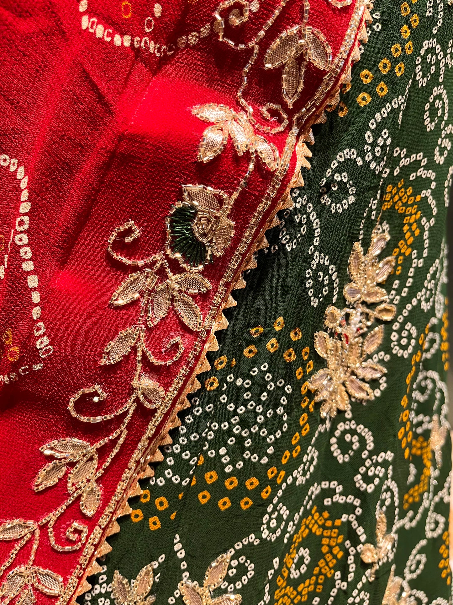 GREEN COLOUR GEORGETTE BANDHANI LEHENGA WITH UNSTITCHED BLOUSE EMBELLISHED WITH CUTDANA & GOTA PATTI WORK