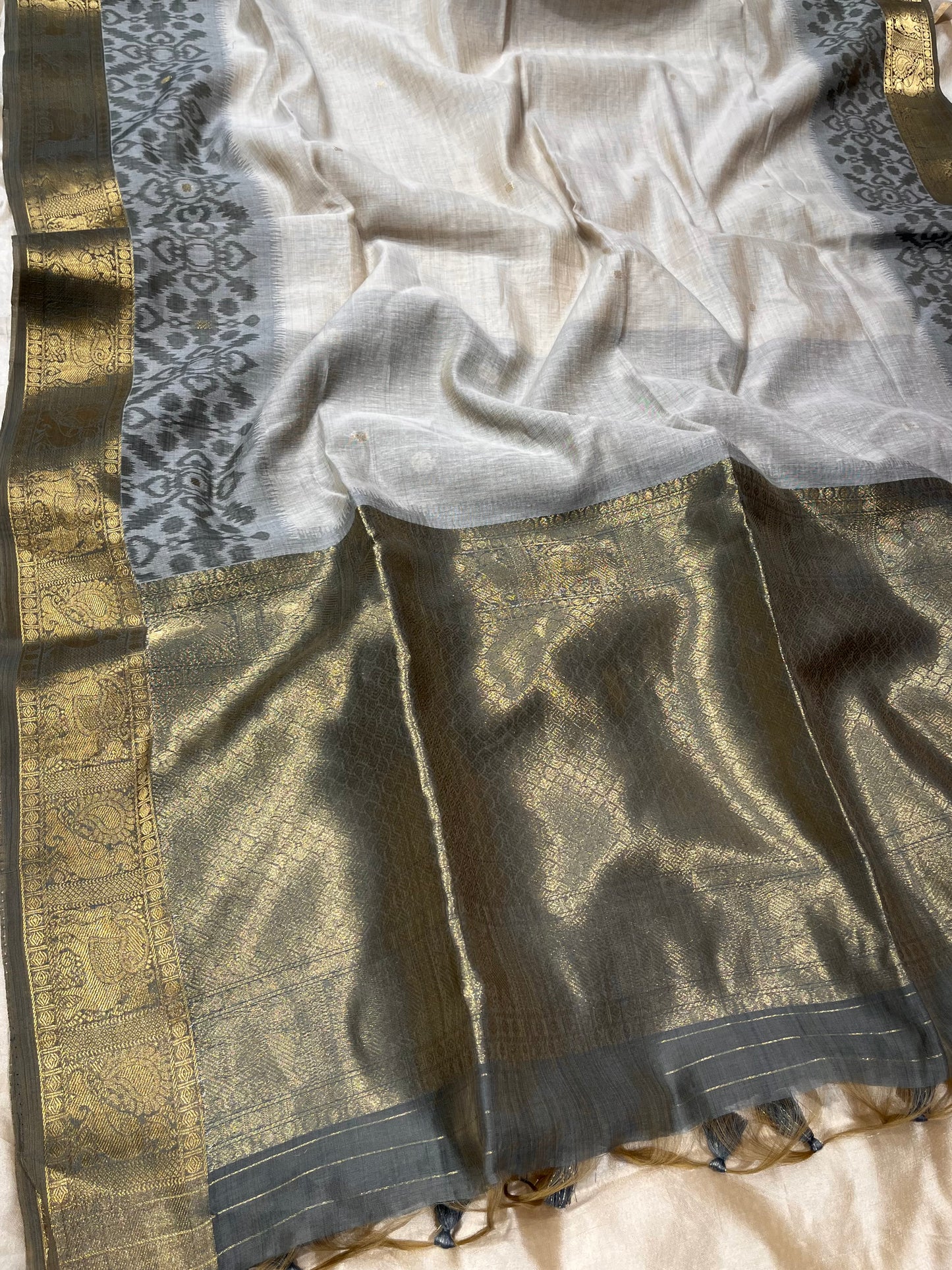 BEIGE COLOUR MUSLIN COTTON IKAT WEAVE SAREE