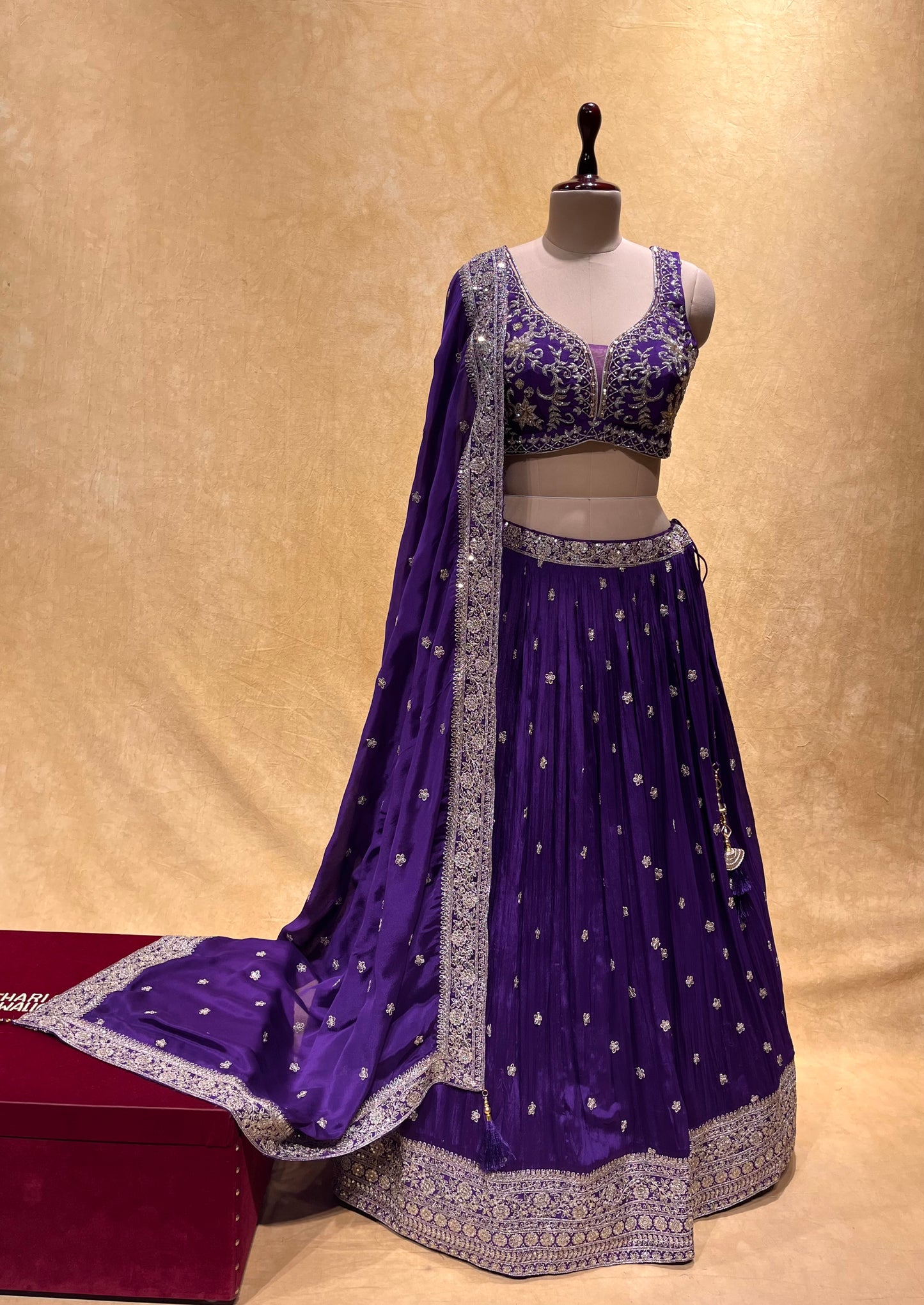 (DELIVERY IN 25 DAYS) PURPLE COLOUR CHINON EMBROIDERED LEHENGA WITH CROP TOP BLOUSE EMBELLISHED WITH CUTDANA & ZARI WORK