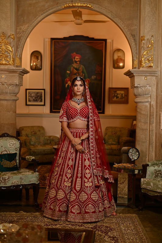 ( DELIVERY IN 40 DAYS ) MAROON COLOUR HAND EMBROIDERED BRIDAL RAW SILK LEHENGA WITH READYMADE BLOUSE EMBELLISHED WITH RESHAM & CUTDANA WORK