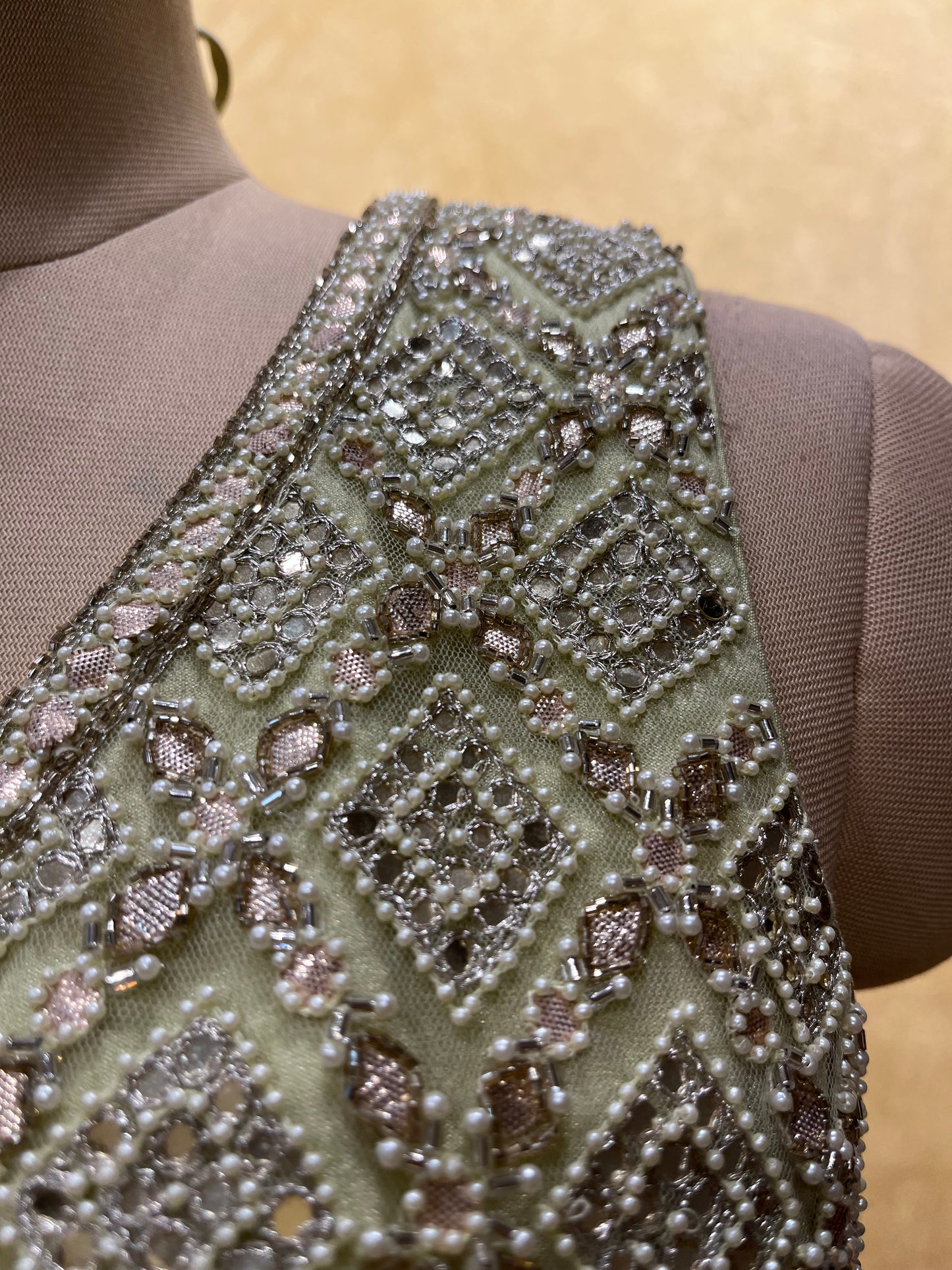 PISTA COLOUR GEORGETTE EMBROIDERED LEHENGA WITH CROP TOP BLOUSE & NET DUPATTA EMBELLISHED WITH MIRROR, PEARL & RESHAM WORK