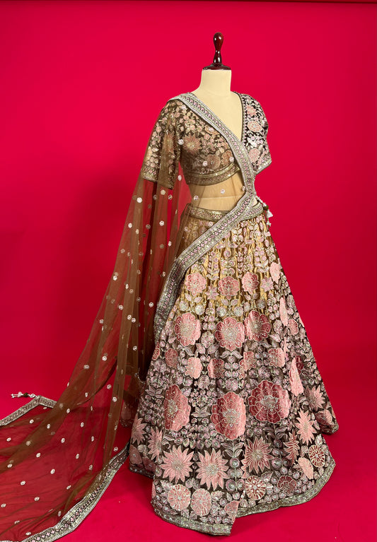 OLIVE GREEN COLOUR VELVET LEHENGA WITH READYMADE BLOUSE & NET DUPATTA EMBELLISHED WITH APPLIQUE, SEQUINS & STONE WORK