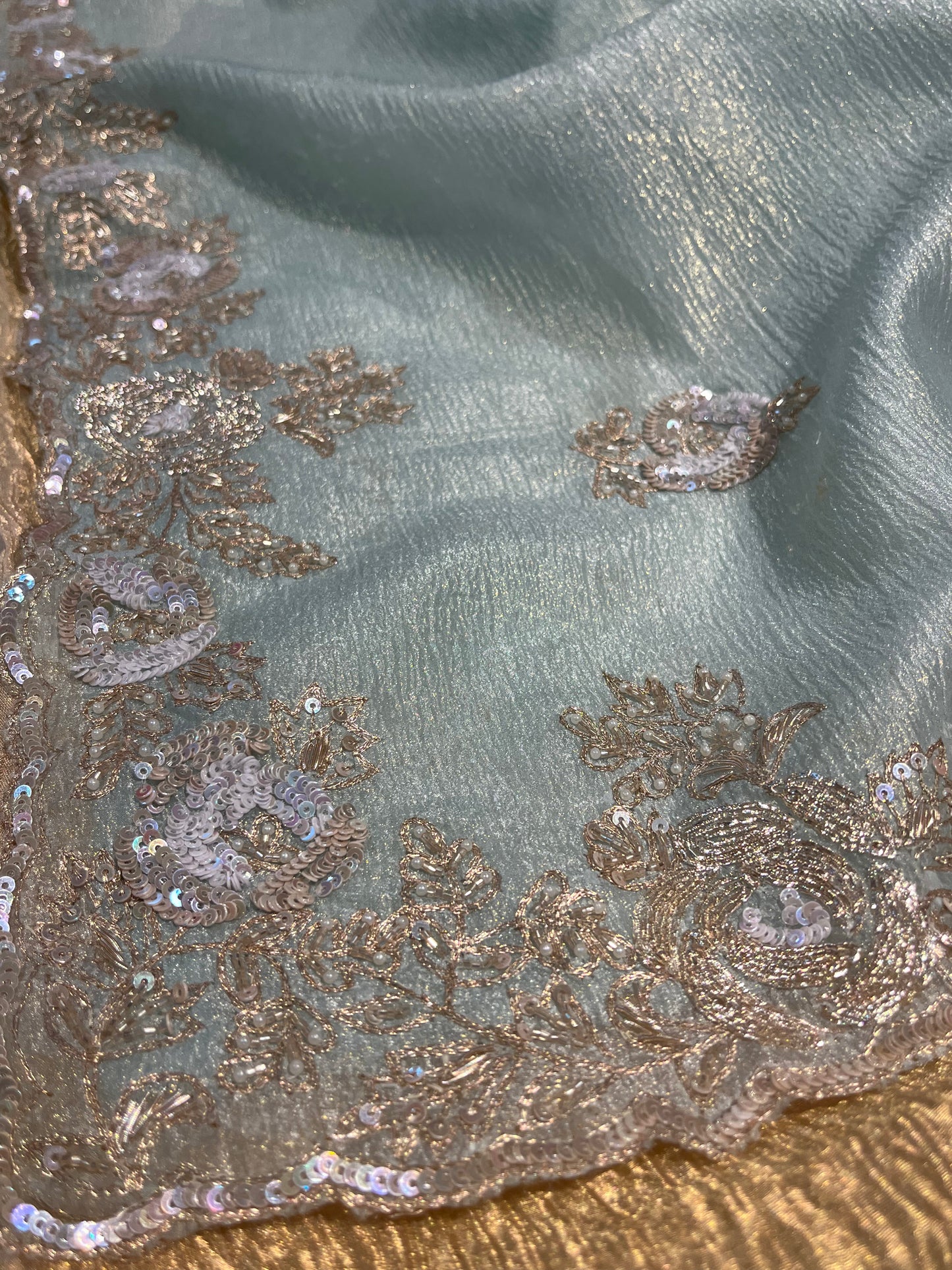AQUA COLOUR CRUSHED TISSUE SAREE EMBELLISHED WITH SEQUINS, KASAB AND CUTDANA WORK