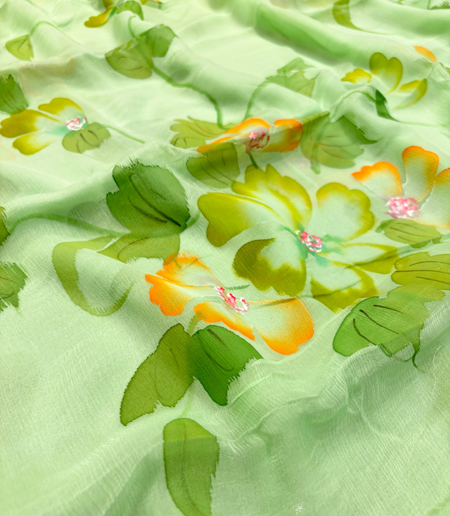 MINT GREEN HAND-PAINTED CHIFFON SAREE WITHOUT BLOUSE( DELIVERY IN 25 DAYS )