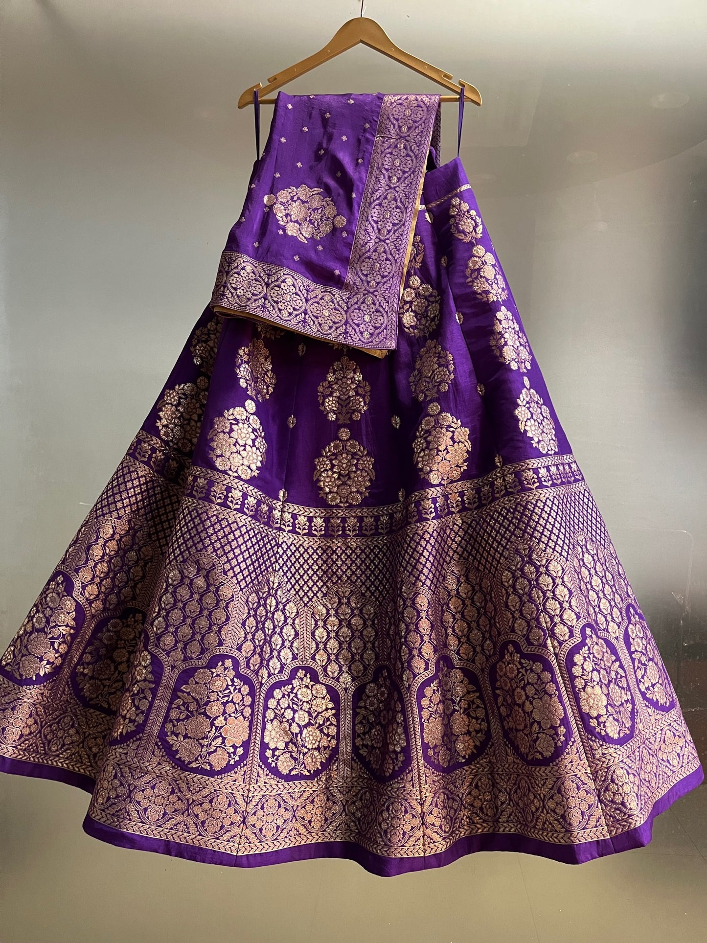 ( DELIVERY IN 25 DAYS ) VIOLET COLOUR BANARASI PURE SILK LEHENGA WITH UNSTITCHED BLOUSE EMBELLISHED WITH ZARI WEAVES