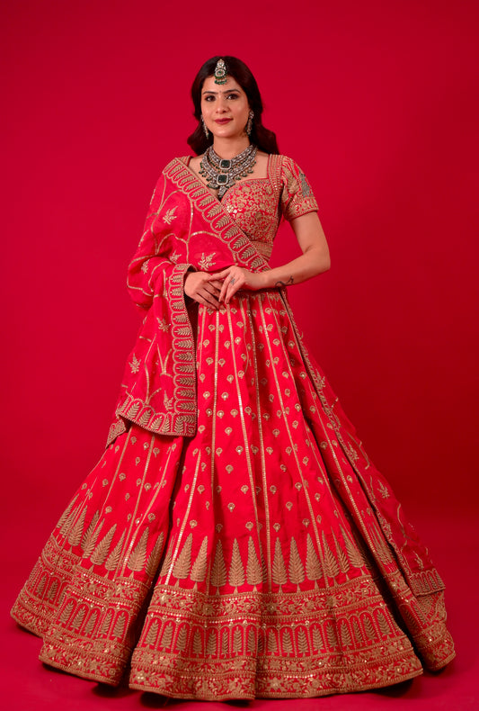 ( DELIVERY IN 50 DAYS ) MAGENTA COLOUR RAW SILK BRIDAL LEHENGA WITH READYMADE BLOUSE & ORGANZA DUPATTA EMBELLISHED WITH ZARI EMBROIDERY