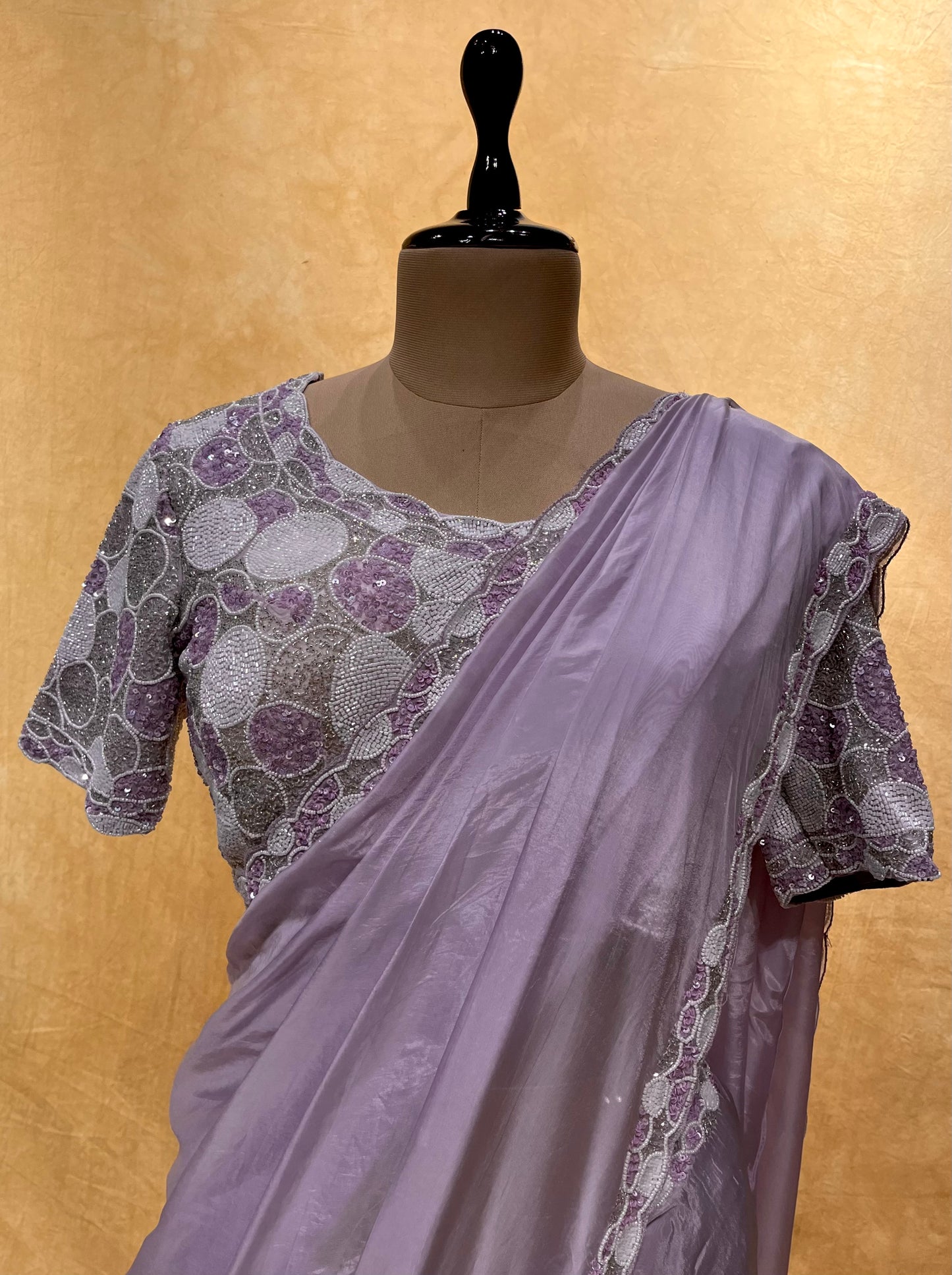 LAVENDER COLOR ORGANZA EMBROIDERED SAREE WITH READYMADE BLOUSE EMBELLISHED WITH CUTDANA, SEQUINS & PEARL WORK