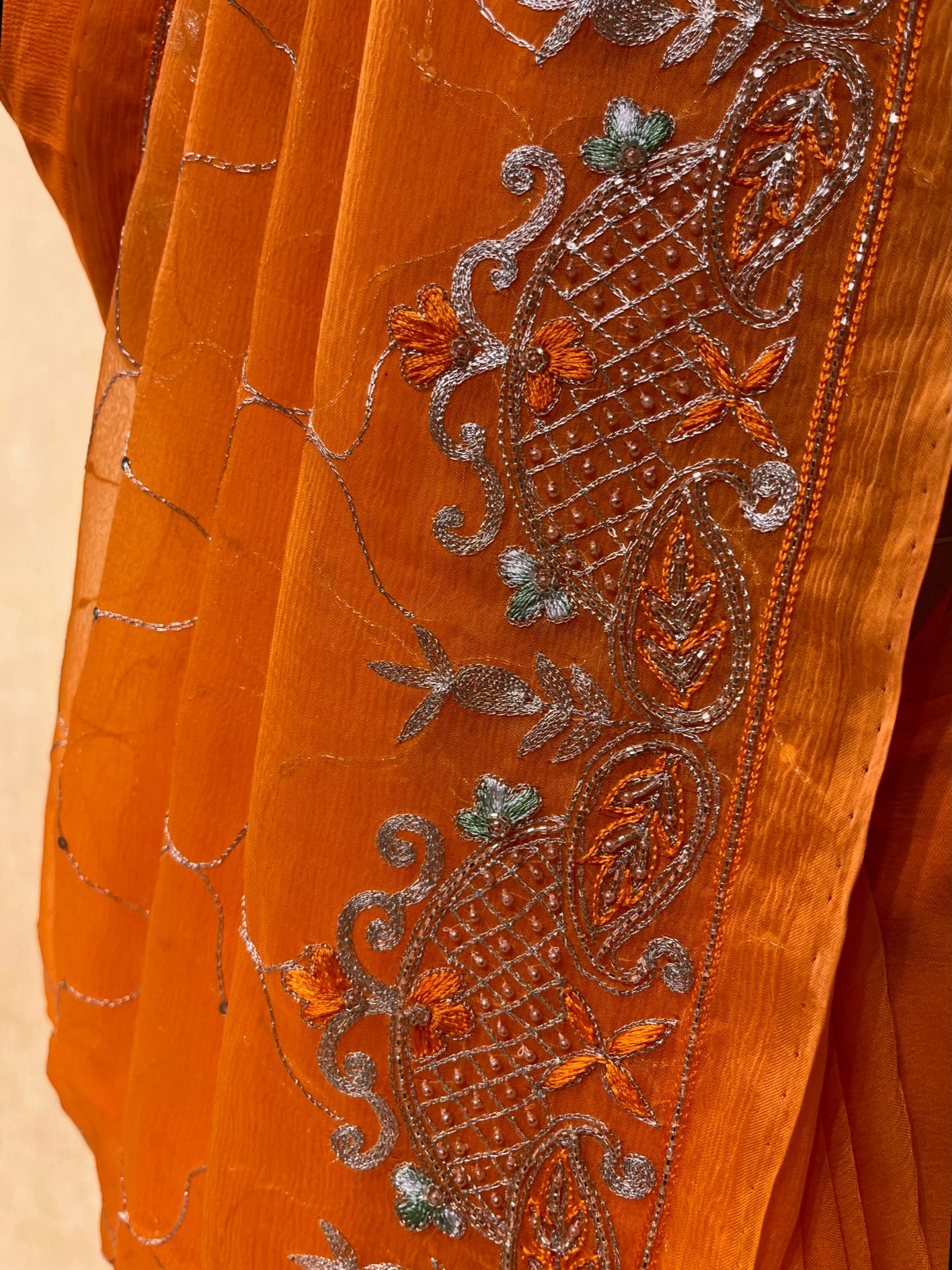 ORANGE COLOUR PURE CHIFFON HAND EMBROIDERED SAREE EMBELLISHED WITH AARI & CUTDANA WORK