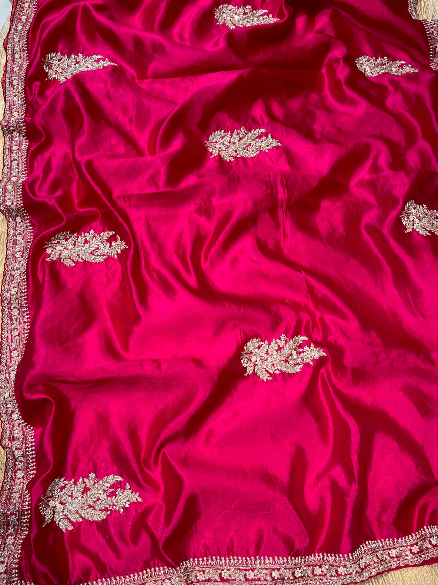 HOT PINK COLOUR RAW SILK HAND EMBROIDERED SAREE EMBELLISHED WITH SEQUINS, CUTDANA & ZARDOZI WORK