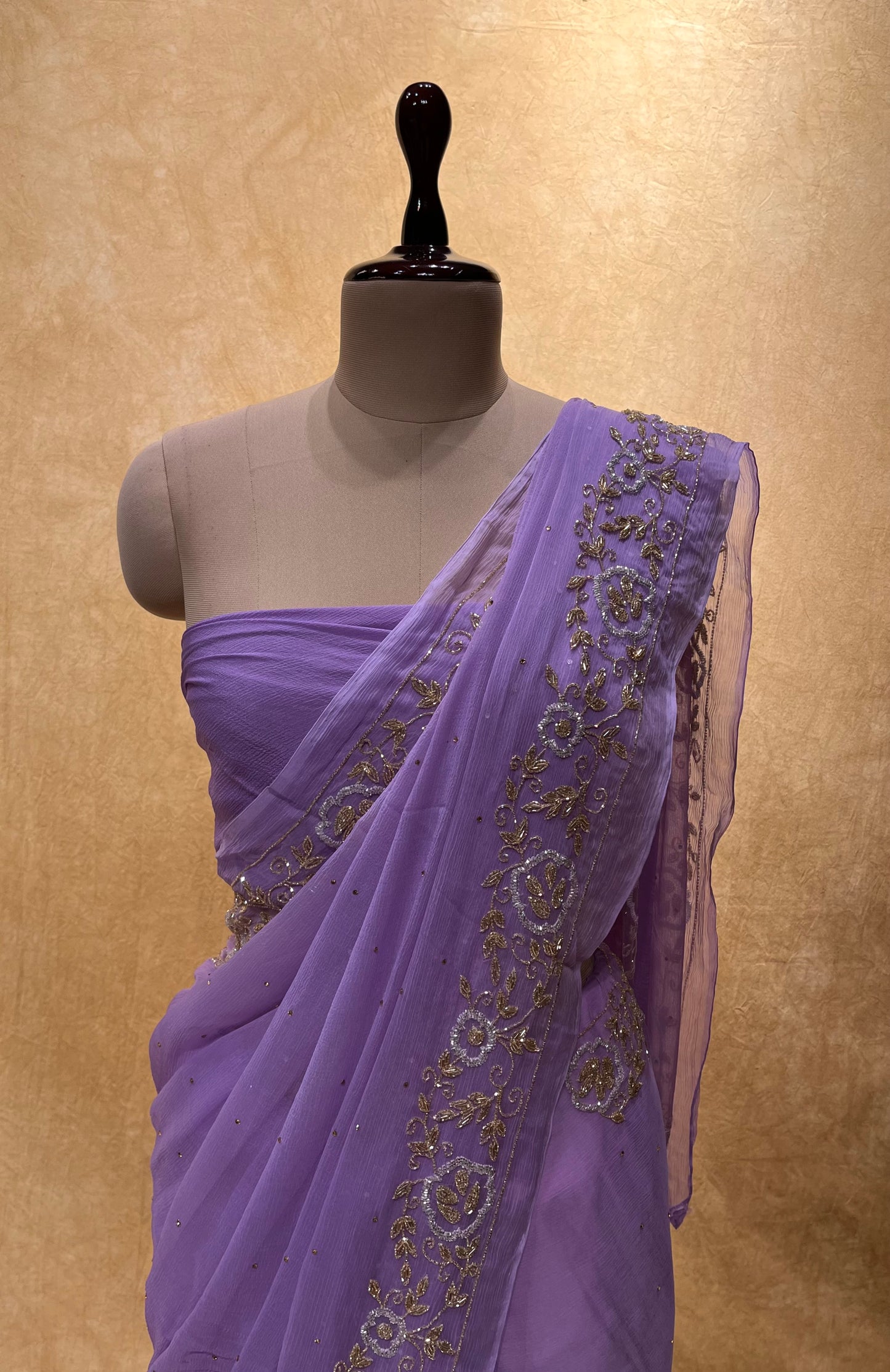 ( DELIVERY IN 25 DAYS ) LAVENDER COLOUR CHIFFON HAND EMBROIDERED SAREE EMBELLISHED WITH CUTDANA WORK