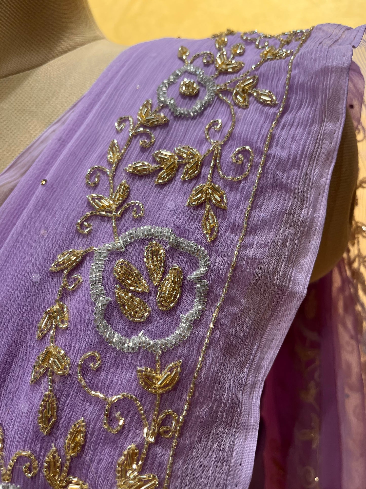 ( DELIVERY IN 25 DAYS ) LAVENDER COLOUR CHIFFON HAND EMBROIDERED SAREE EMBELLISHED WITH CUTDANA WORK