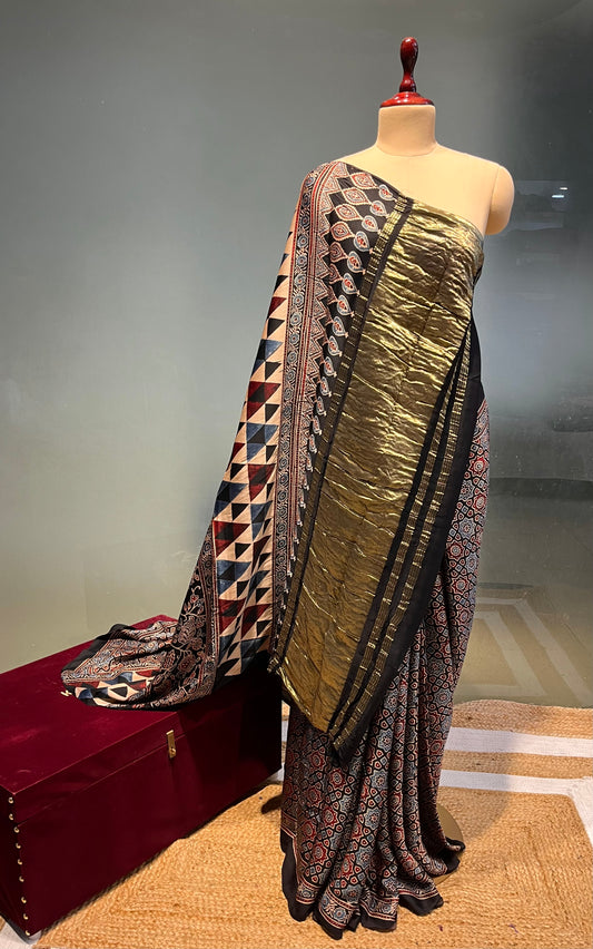 ( DELIVERY IN 20-25 DAYS ) BLACK COLOUR AJRAKH PRINT MODAL SILK SAREE