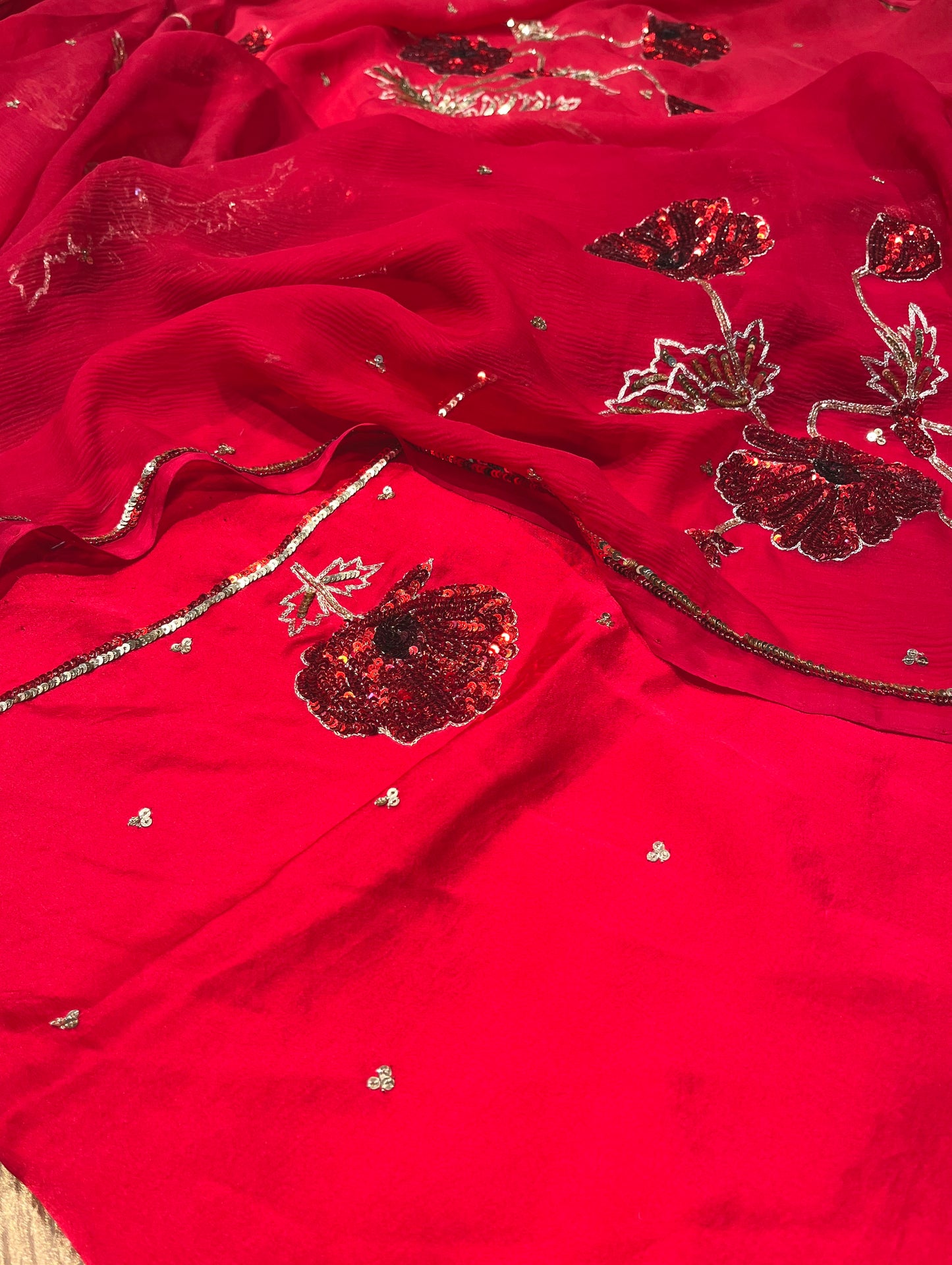 ( DELIVERY IN 30 DAYS ) RED COLOUR PURE CHIFFON HAND EMBROIDERED SAREE WITH CREPE BLOUSE EMBELLISHED WITH SEQUINS & AARI WORK