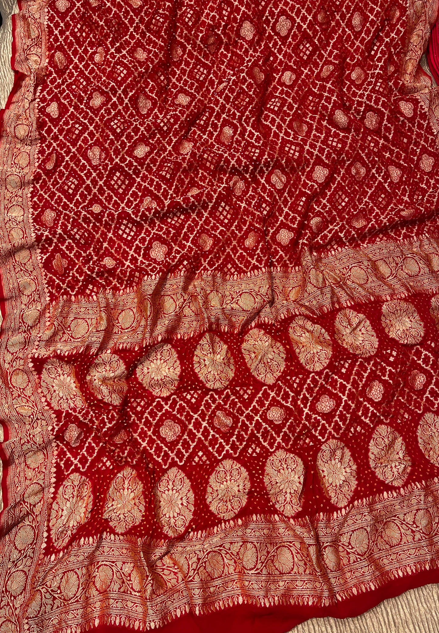 RED COLOUR PURE GEORGETTE KHADDI SAREE WITH BANDHANI PRINT EMBELLISHED WITH ANTIQUE ZARI WEAVES