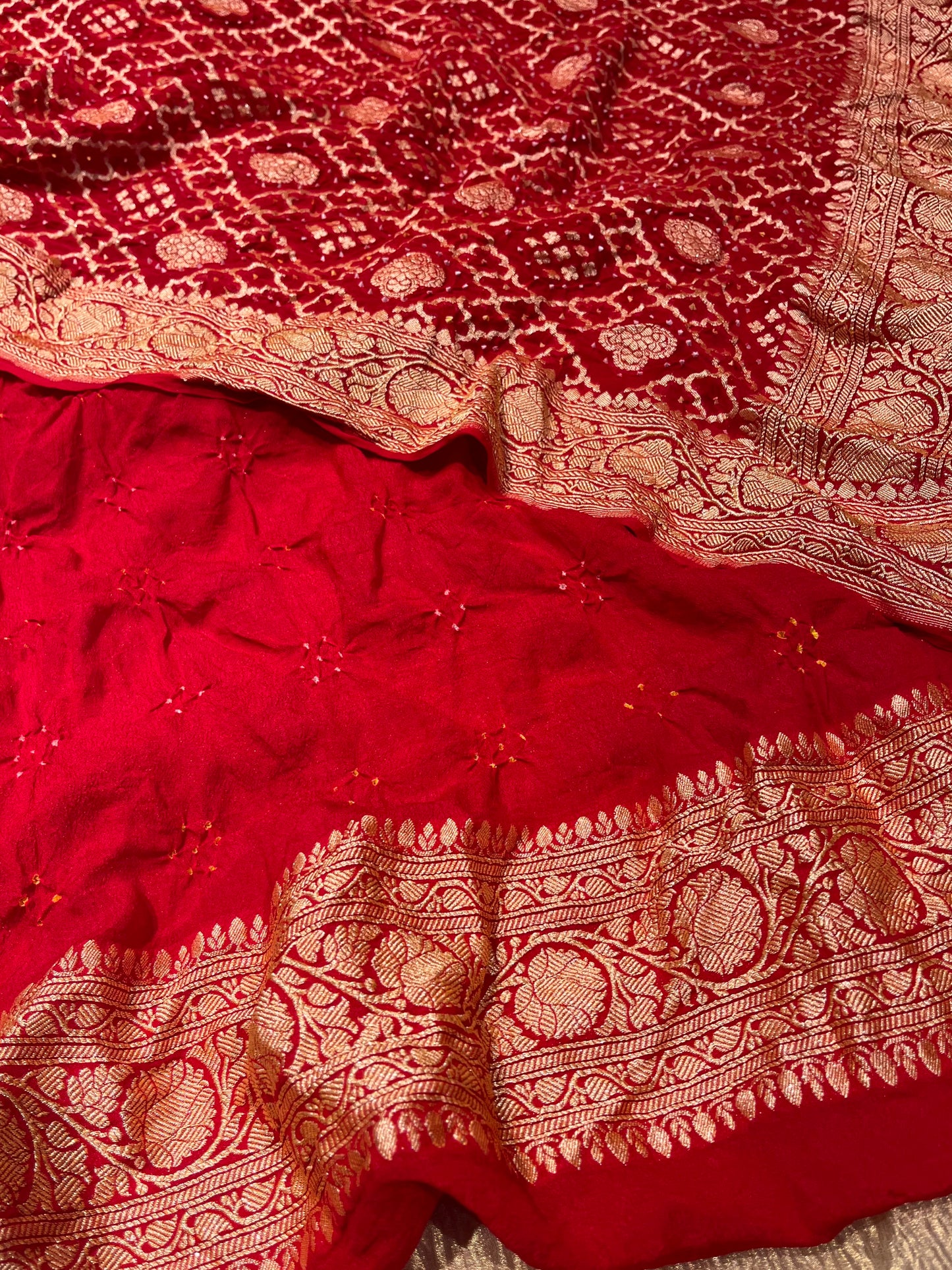 RED COLOUR PURE GEORGETTE KHADDI SAREE WITH BANDHANI PRINT EMBELLISHED WITH ANTIQUE ZARI WEAVES