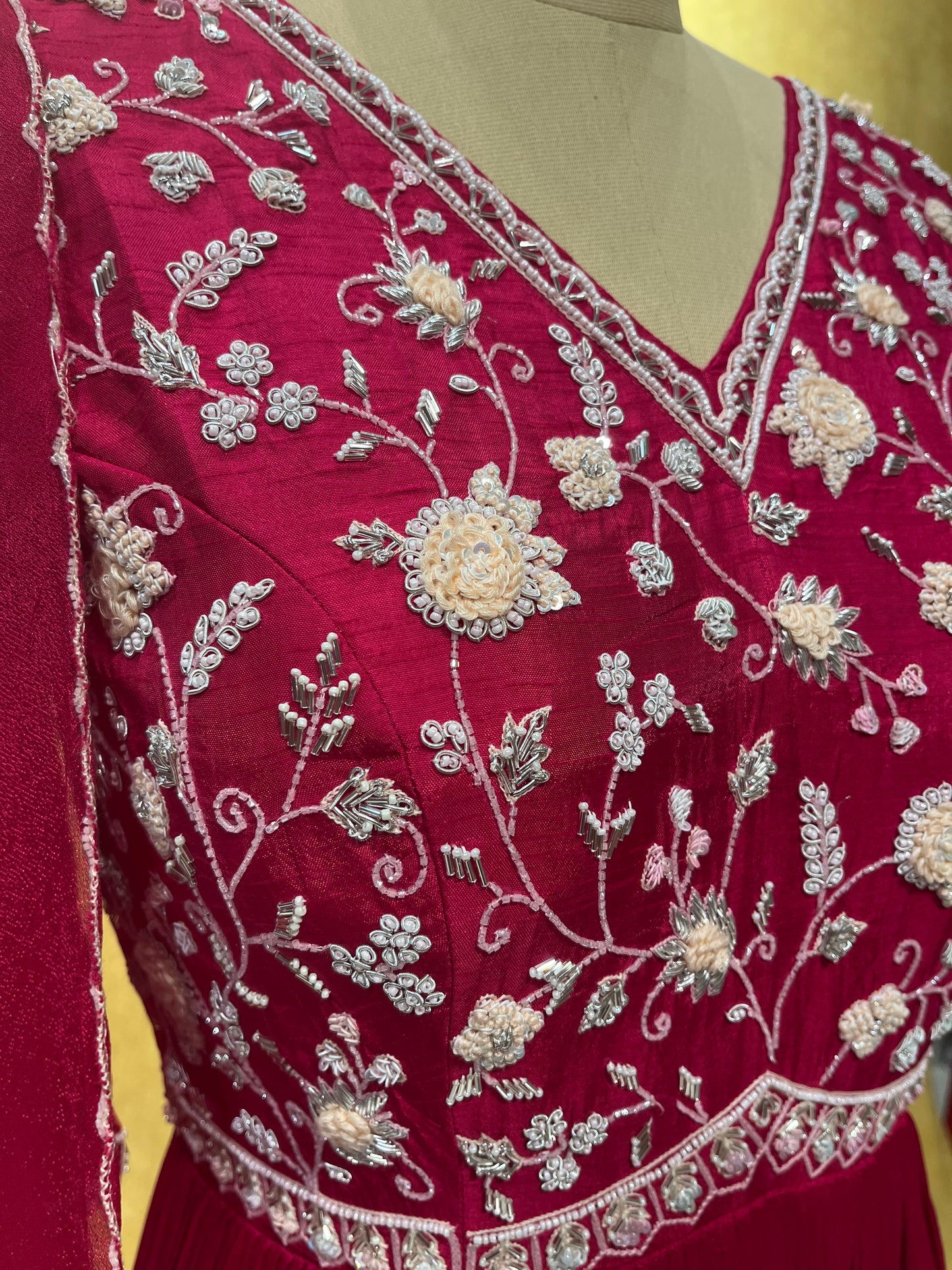 RANI COLOR CREPE SILK ANARKALI EMBROIDERED SUIT EMBELLISHED WITH CUTDANA & BEADS WORK