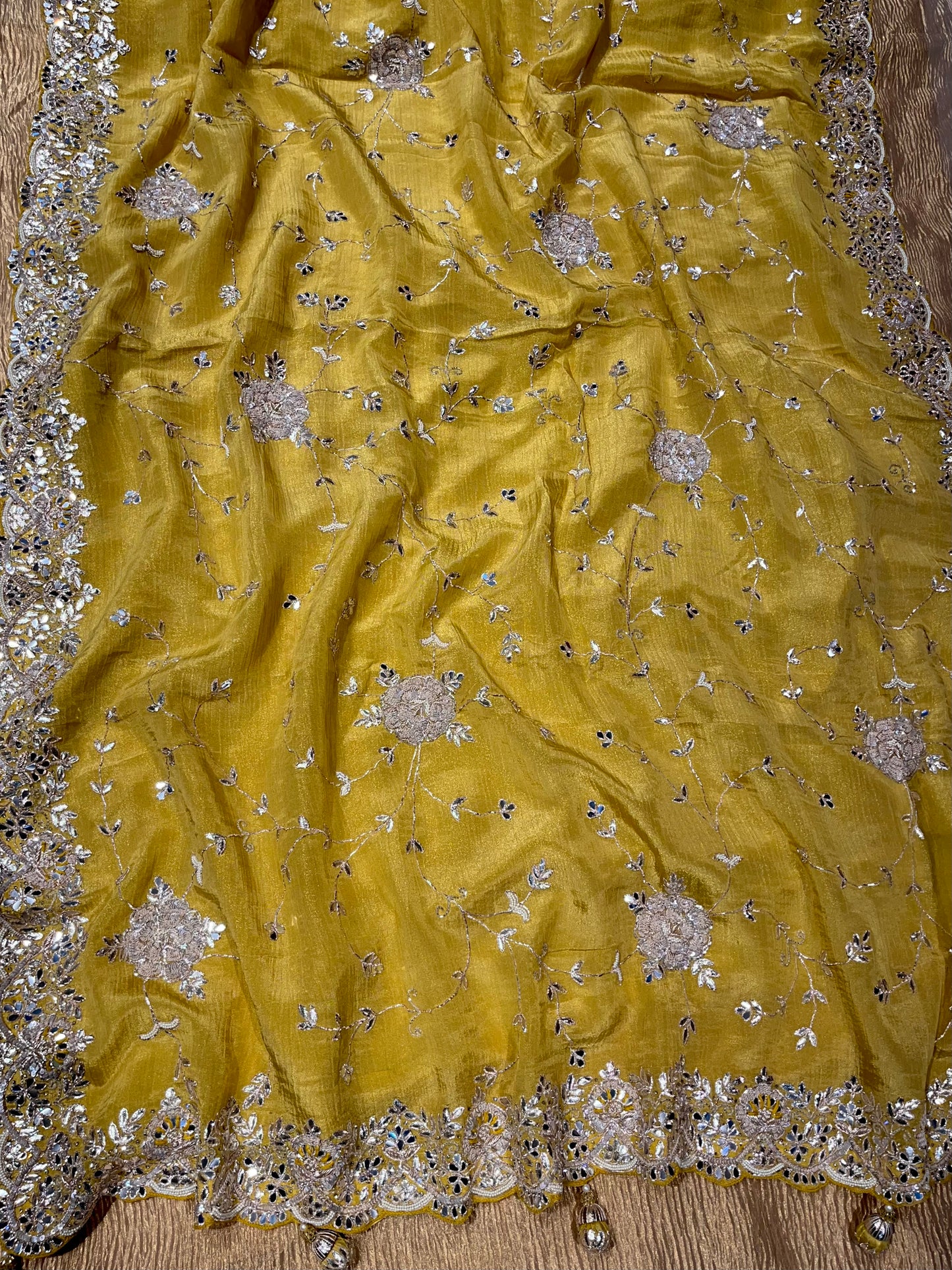 YELLOW COLOUR CREPE TISSUE EMBROIDERER SAREE EMBELLISHED WITH GOTA PATTI, SEQUINS & MIRROR FOIL WORK