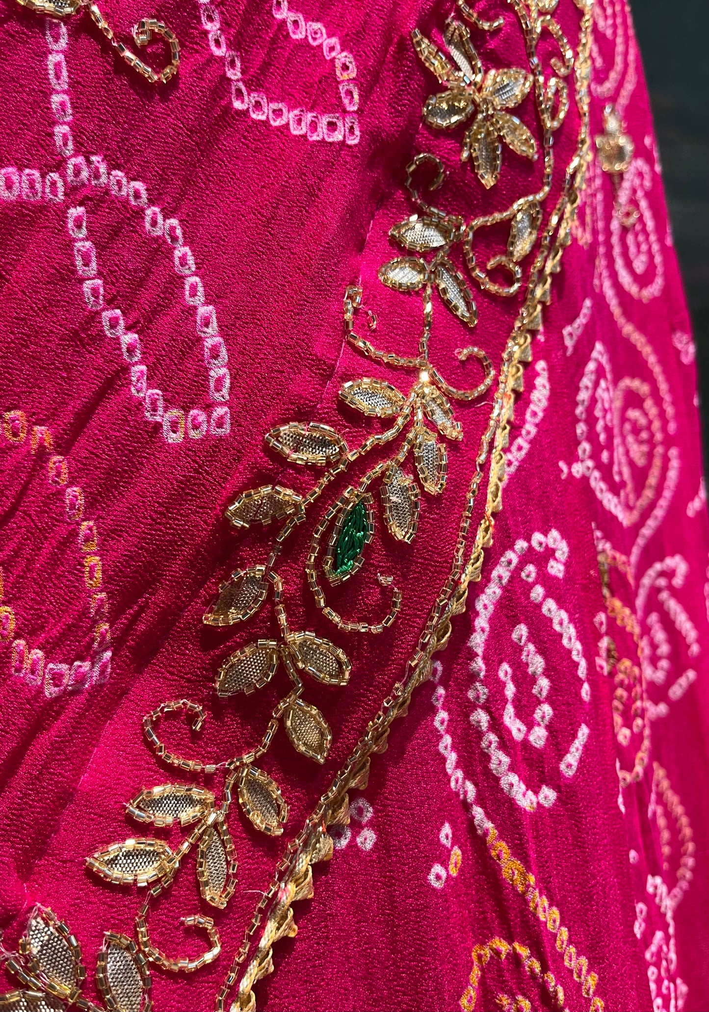 RANI PINK COLOUR GEORGETTE OJARIYA BANDHANI LEHENGA WITH UNSTITCHED BLOUSE EMBELLISHED WITH GOTA PATTI WORK