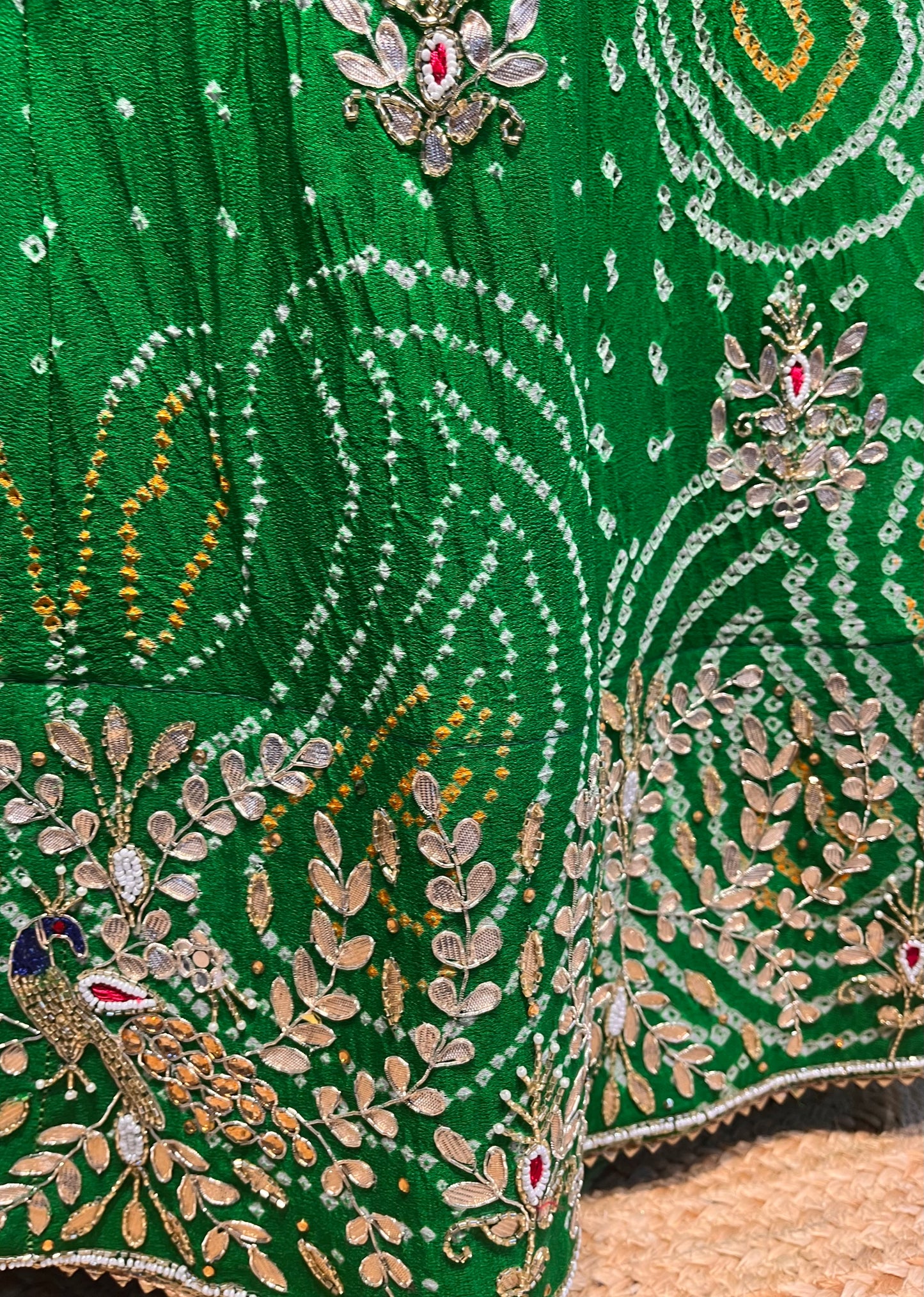 GREEN COLOUR GEORGETTE OJARIYA BANDHANI LEHENGA WITH UNSTITCHED BLOUSE EMBELLISHED WITH GOTA PATTI & CUTDANA WORK