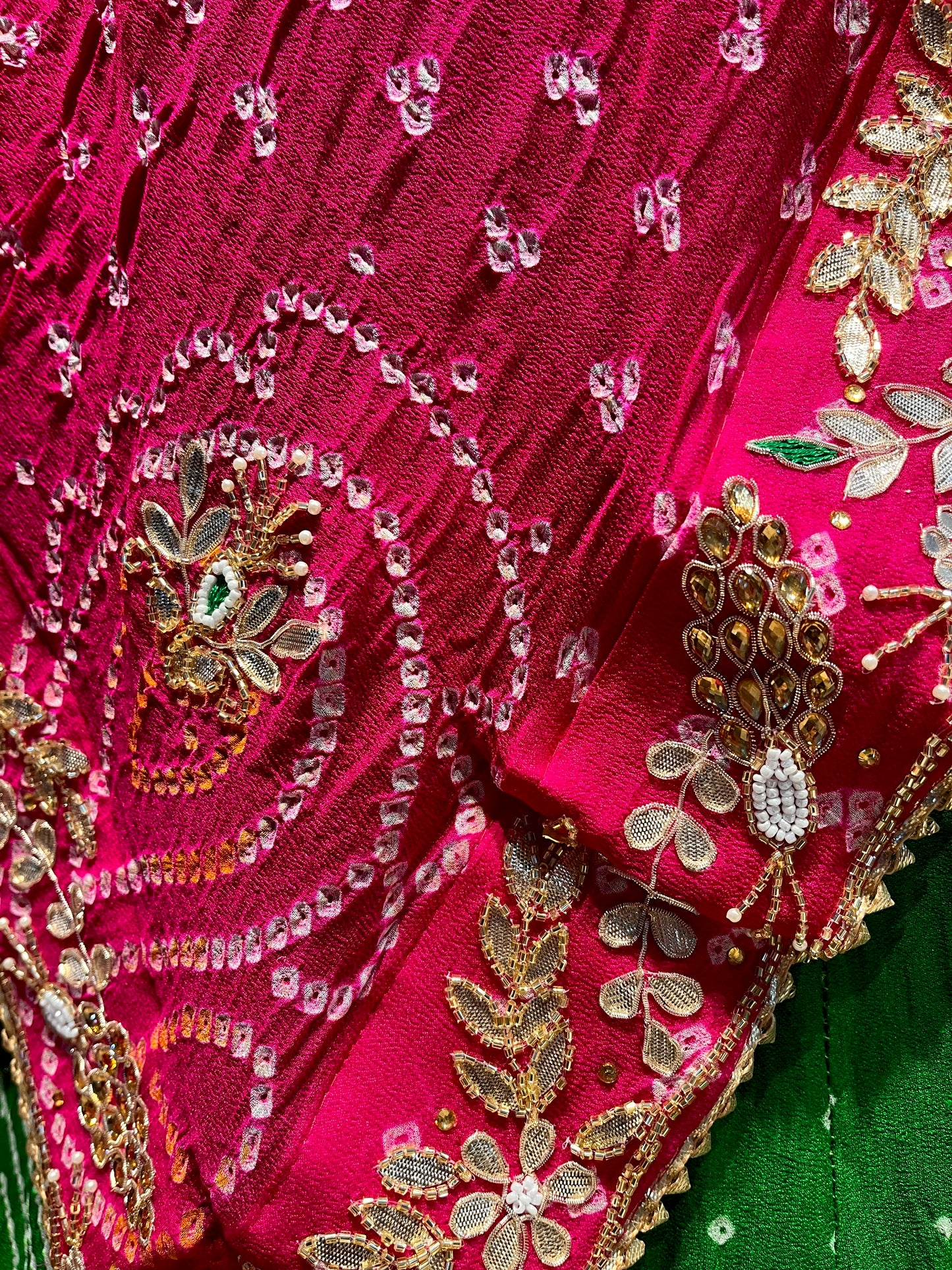 GREEN COLOUR GEORGETTE OJARIYA BANDHANI LEHENGA WITH UNSTITCHED BLOUSE EMBELLISHED WITH GOTA PATTI & CUTDANA WORK