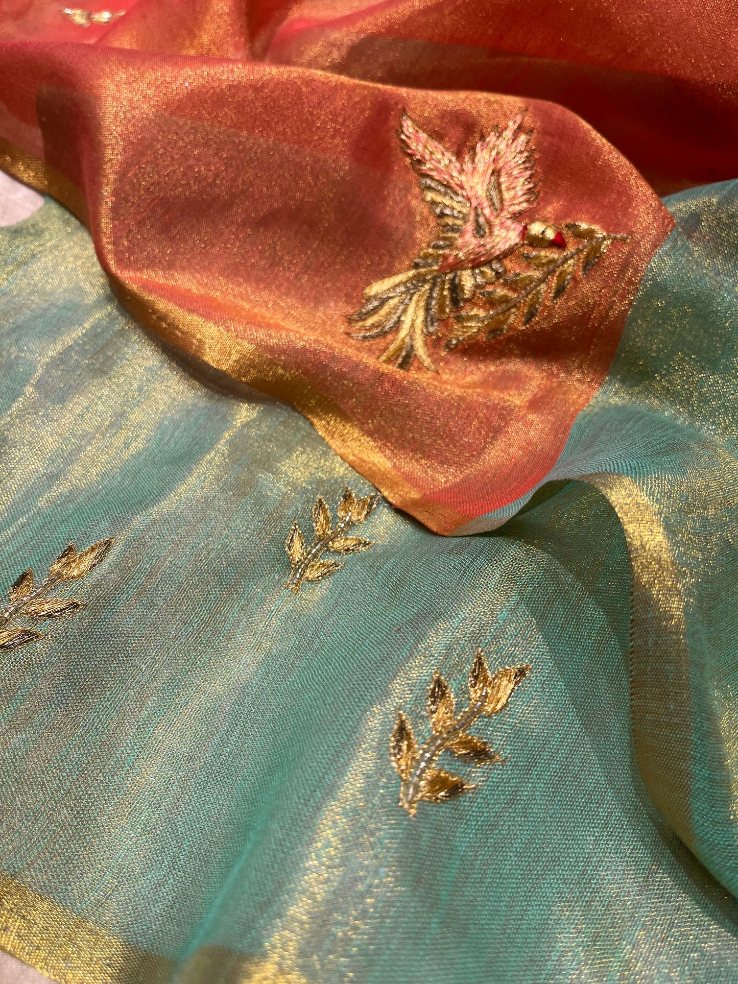 ORANGE COLOUR TISSUE HAND EMBROIDERED SAREE EMBELLISHED WITH AARI & CUTDANA WORK