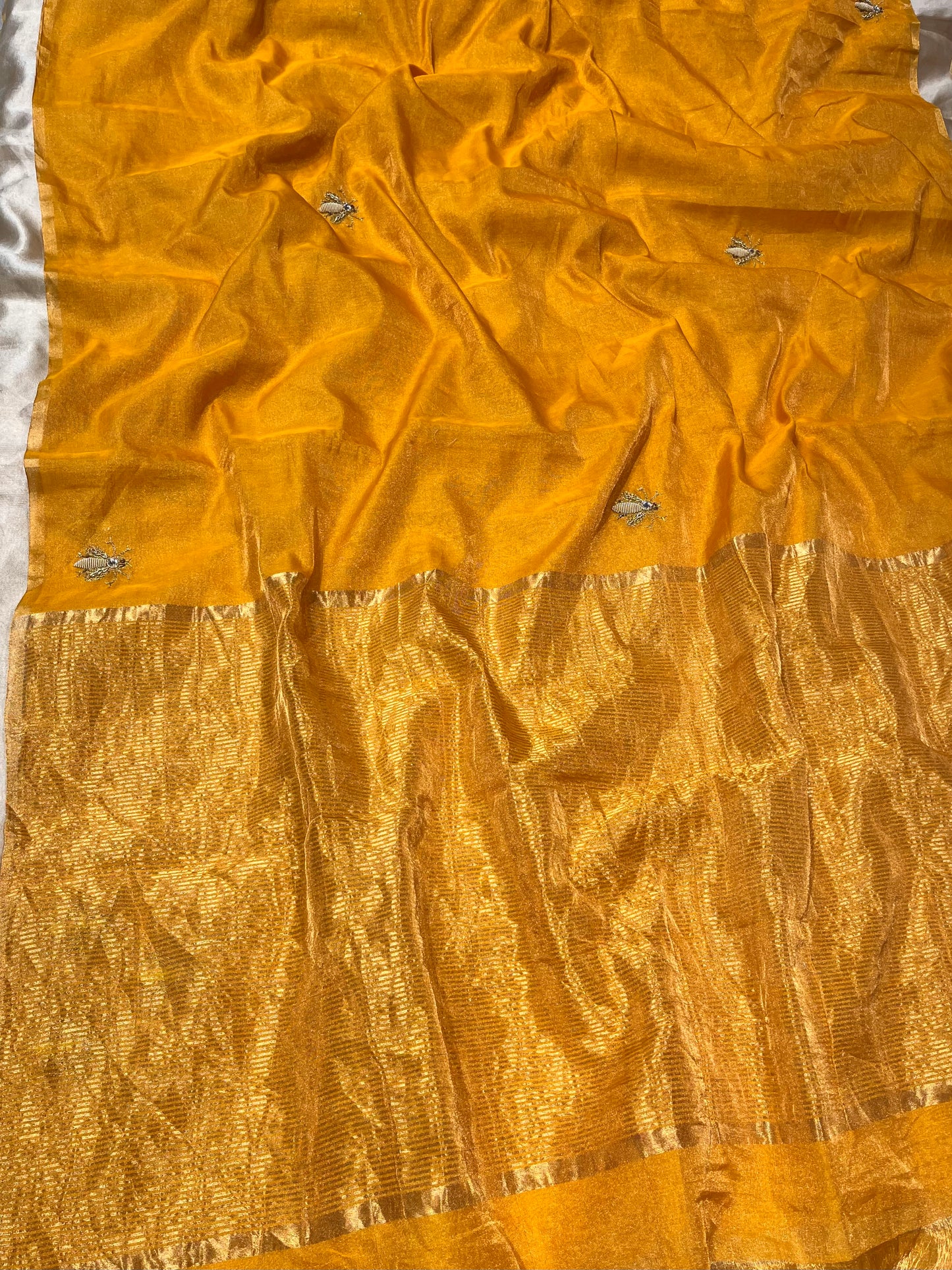 MUSTARD COLOUR CHANDERI TISSUE HAND EMBROIDERED SAREE EMBELLISED WITH ZARDOZI WORK