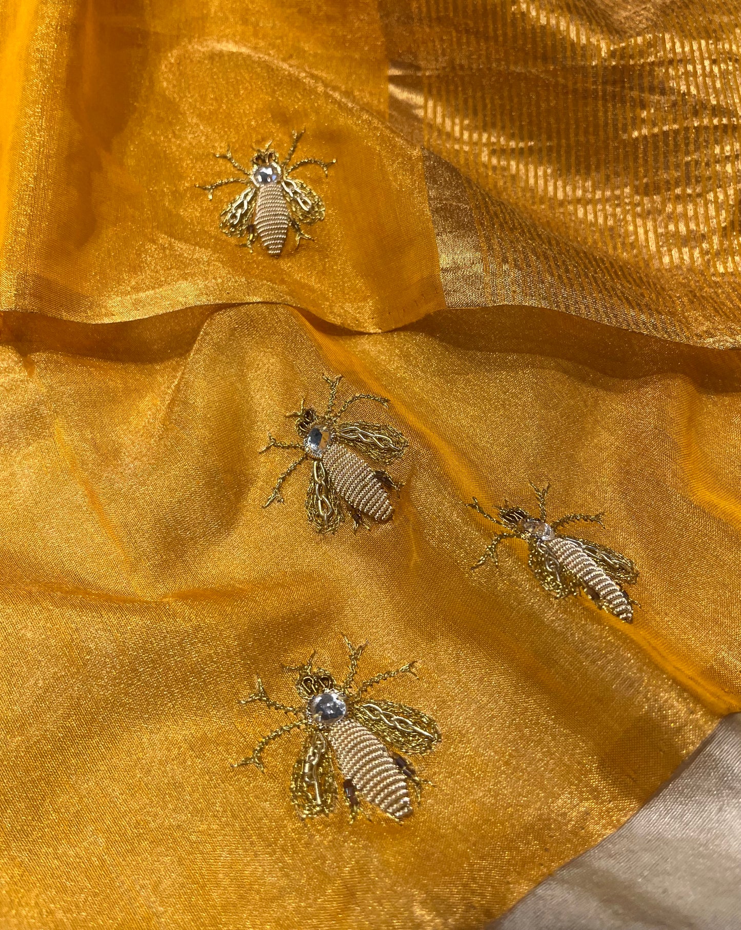 MUSTARD COLOUR CHANDERI TISSUE HAND EMBROIDERED SAREE EMBELLISED WITH ZARDOZI WORK