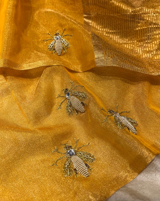 MUSTARD COLOUR CHANDERI TISSUE HAND EMBROIDERED SAREE EMBELLISED WITH ZARDOZI WORK