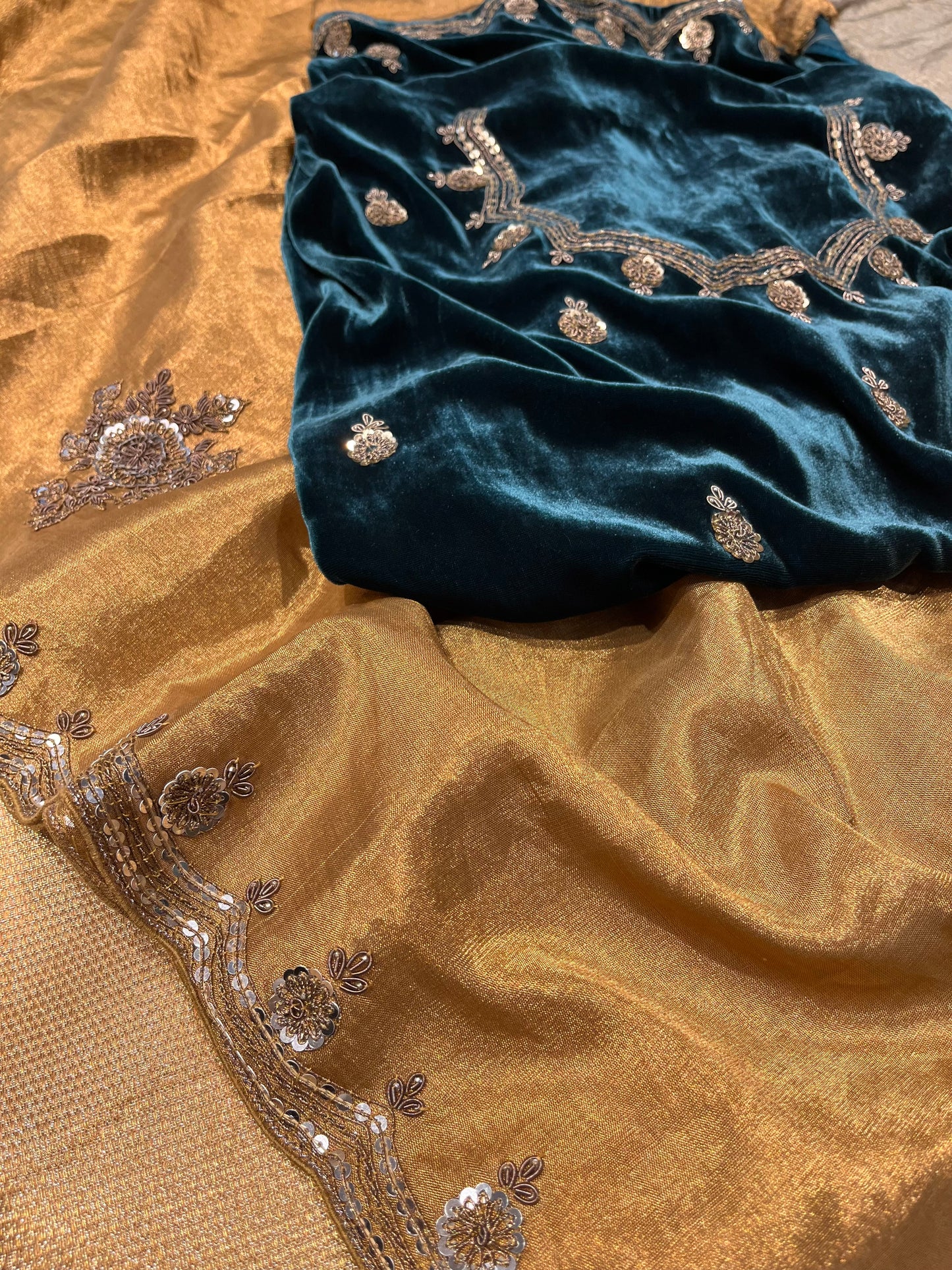 GOLDEN SILVER CHANDERI TISSUE ANTIQUE ZARI EMBROIDERED SAREE WITH TEAL BLUE COLOR VELVET BLOUSE