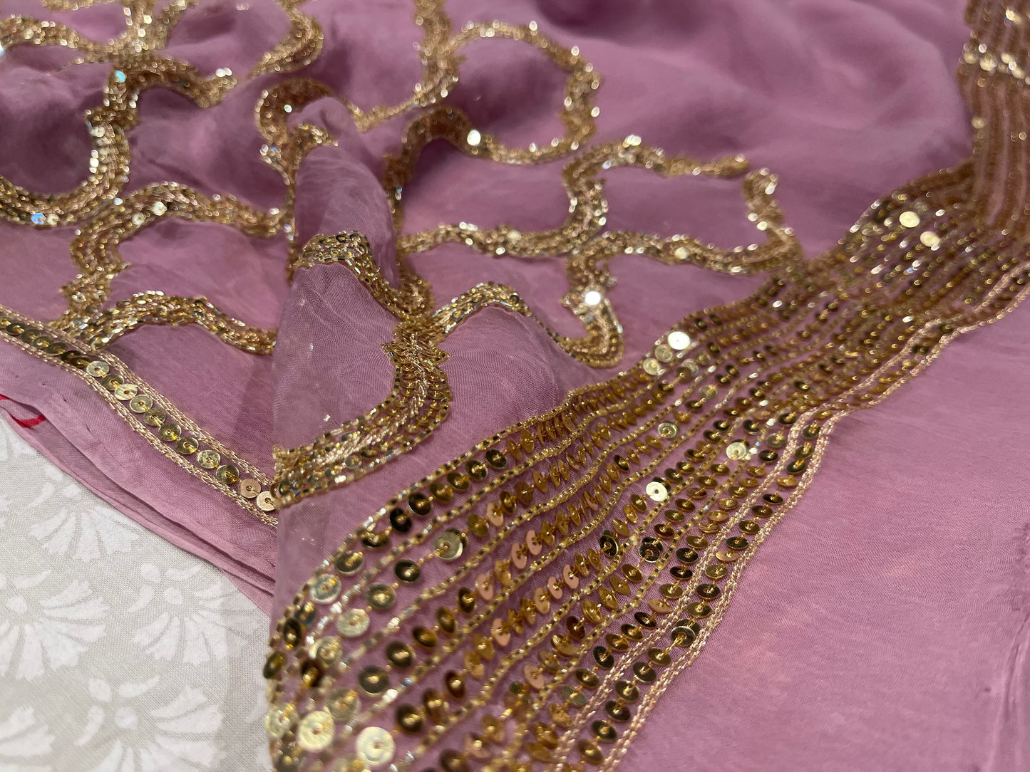 LAVENDER COLOUR PURE CHIFFON HAND EMBROIDERED SAREE EMBELLISHED WITH SEQUINS & CUD